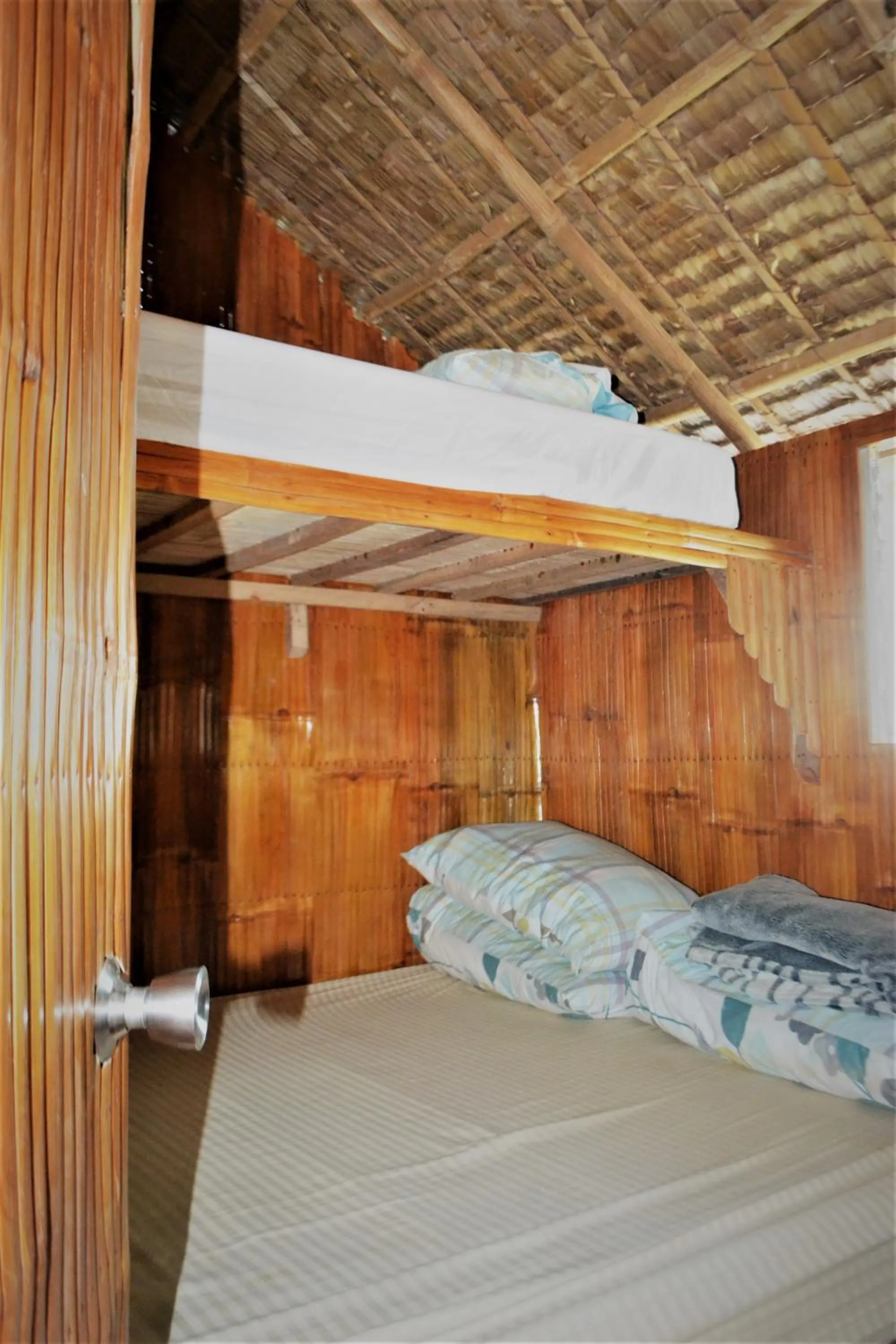 Bed in Nature Care Resort and Farm