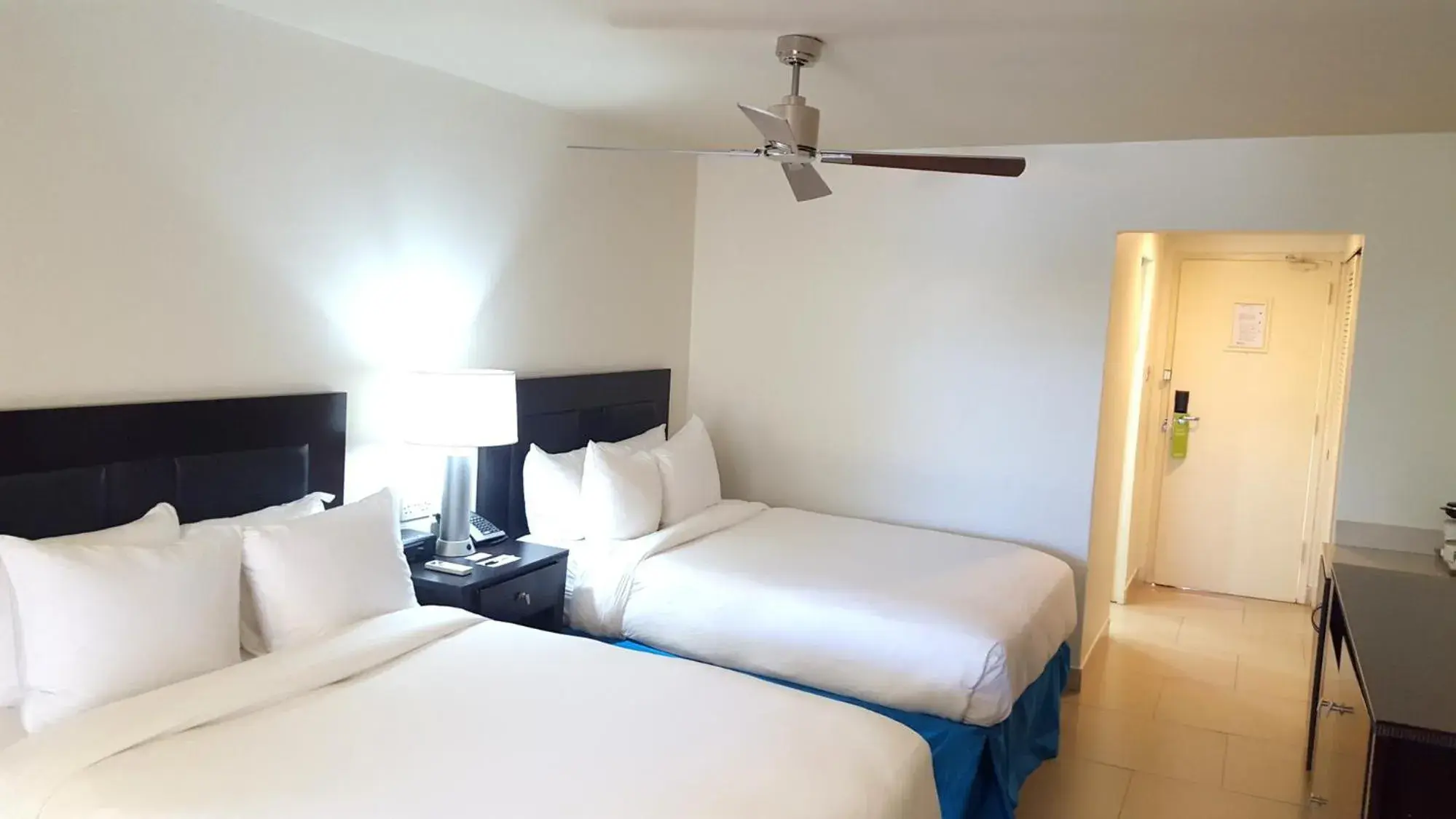 Double Room with Two Double Beds and Garden View in Radisson Grenada Beach Resort Double Room with Two Double Beds and Garden View in Radisson Grenada Beach Resort