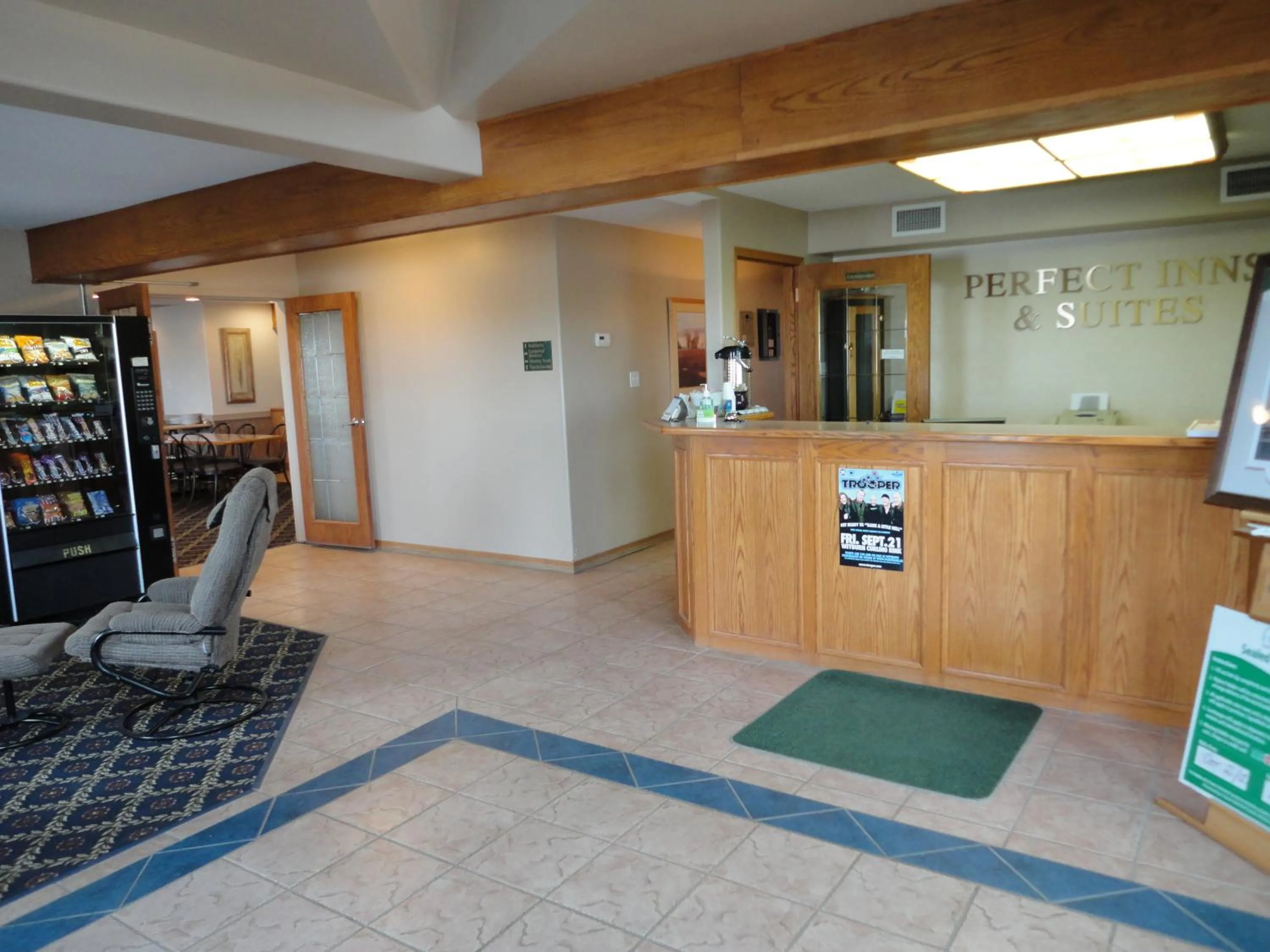 Lobby or reception in Perfect Inns & Suites