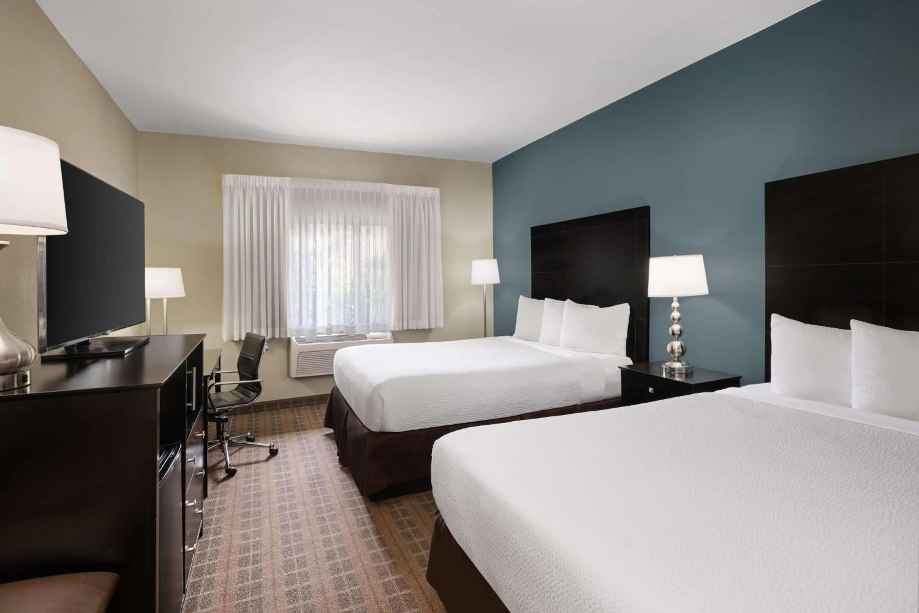 Bedroom, Bed in La Cuesta Inn, BW Signature Collection