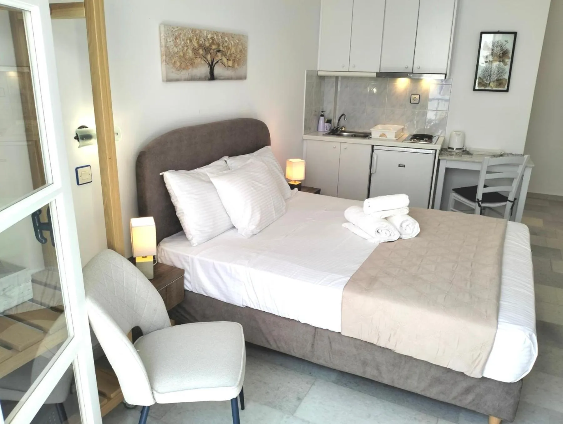 Bedroom, Bed in Nostos Studios at Saint George beach Agios Georgios Chora Naxos town