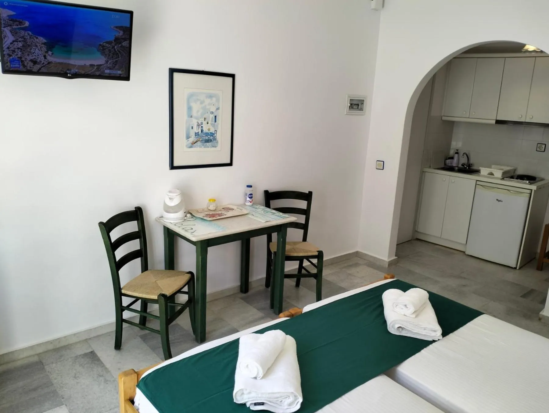 Kitchen or kitchenette in Nostos Studios at Saint George beach Agios Georgios Chora Naxos town