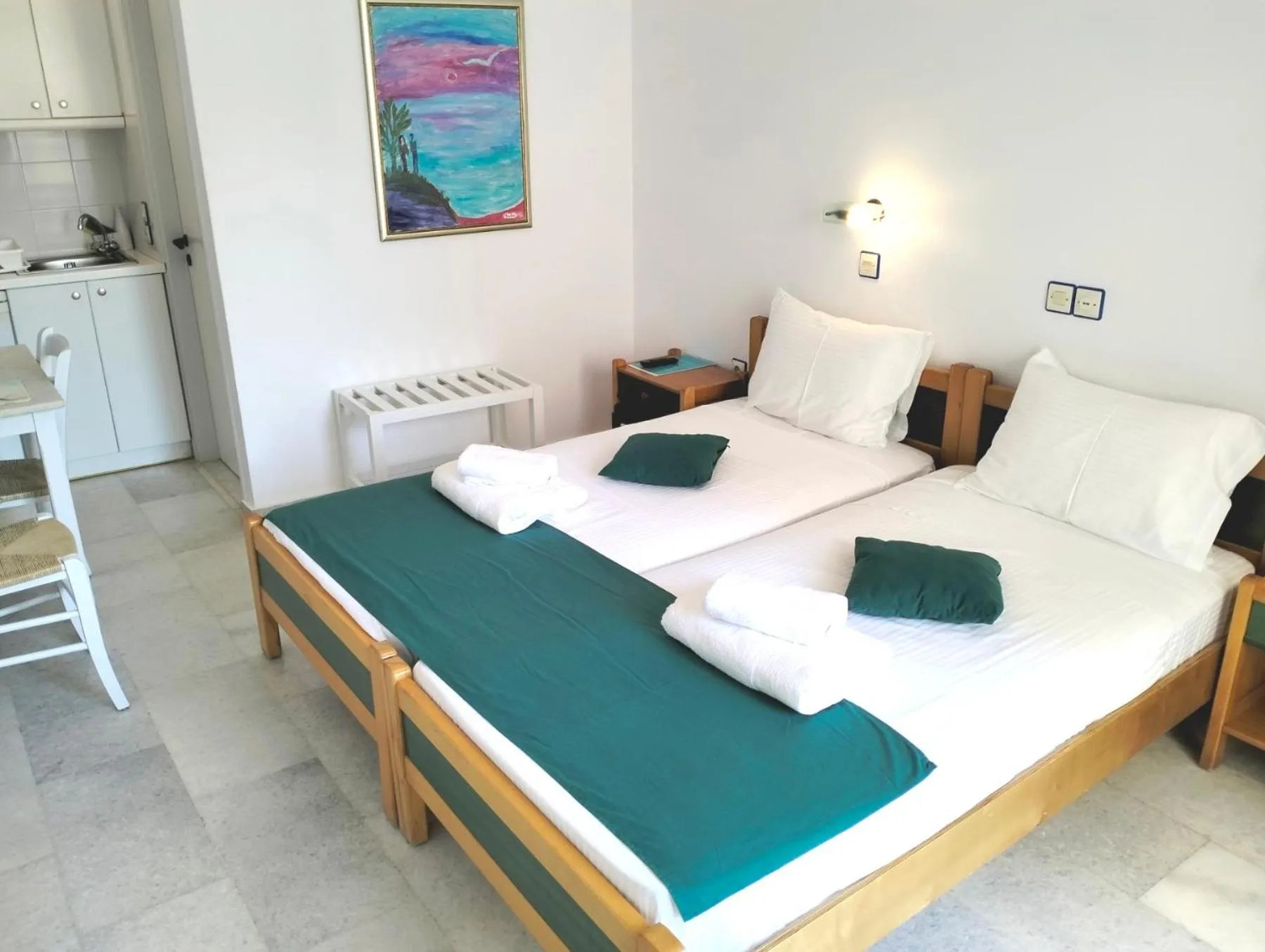 Bed in Nostos Studios at Saint George beach Agios Georgios Chora Naxos town