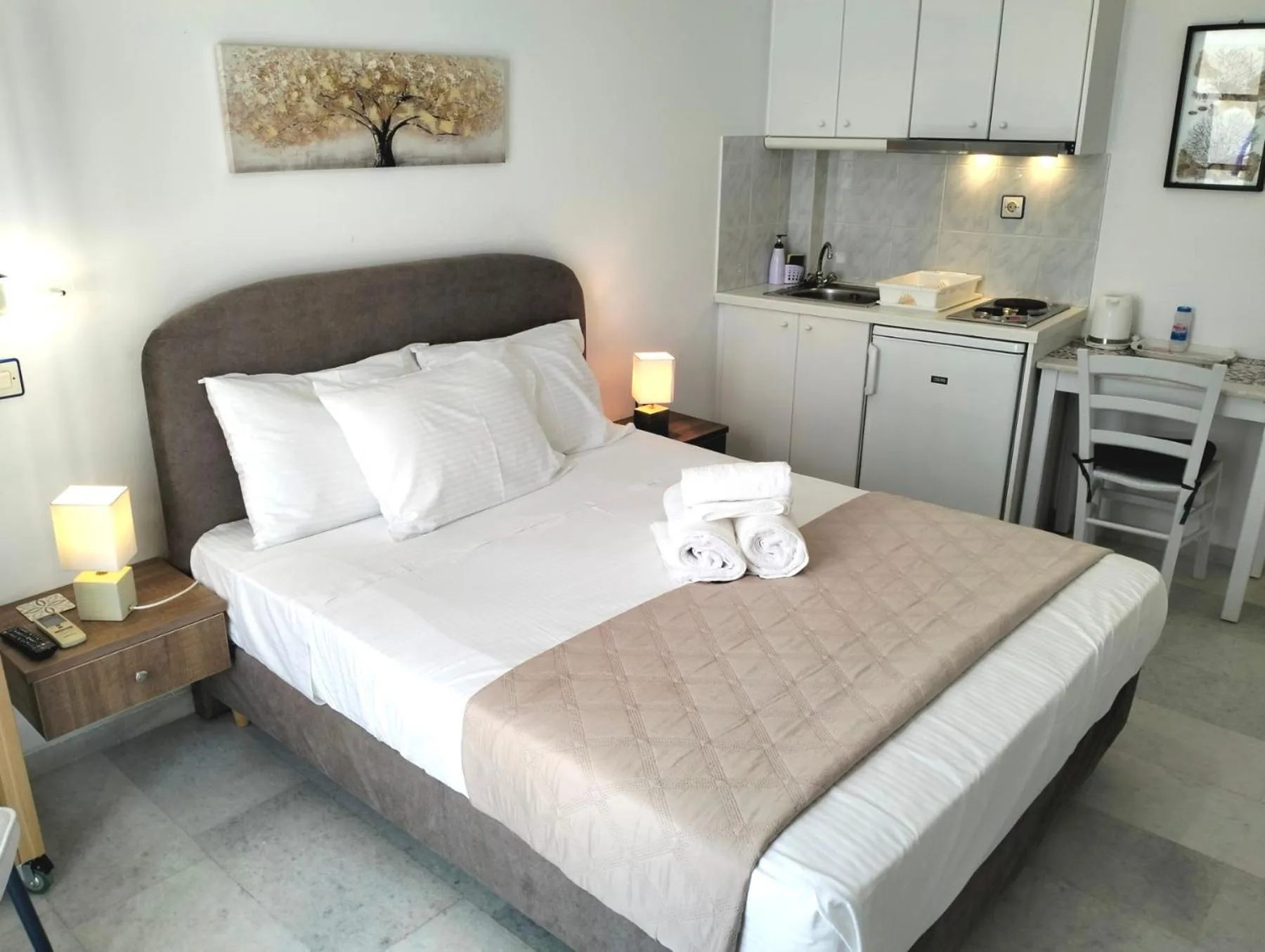 Bedroom, Bed in Nostos Studios at Saint George beach Agios Georgios Chora Naxos town