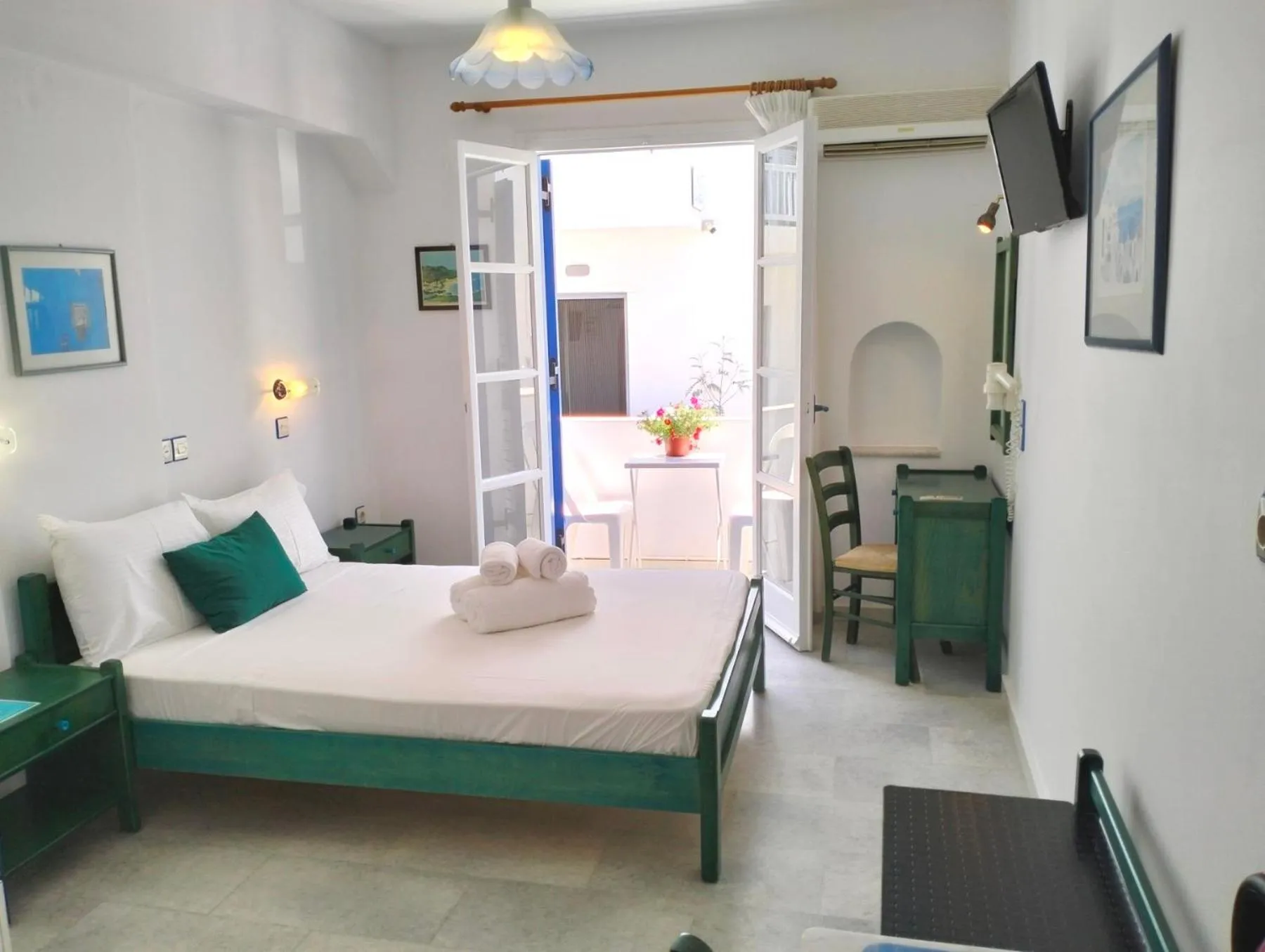 Bed in Nostos Studios at Saint George beach Agios Georgios Chora Naxos town