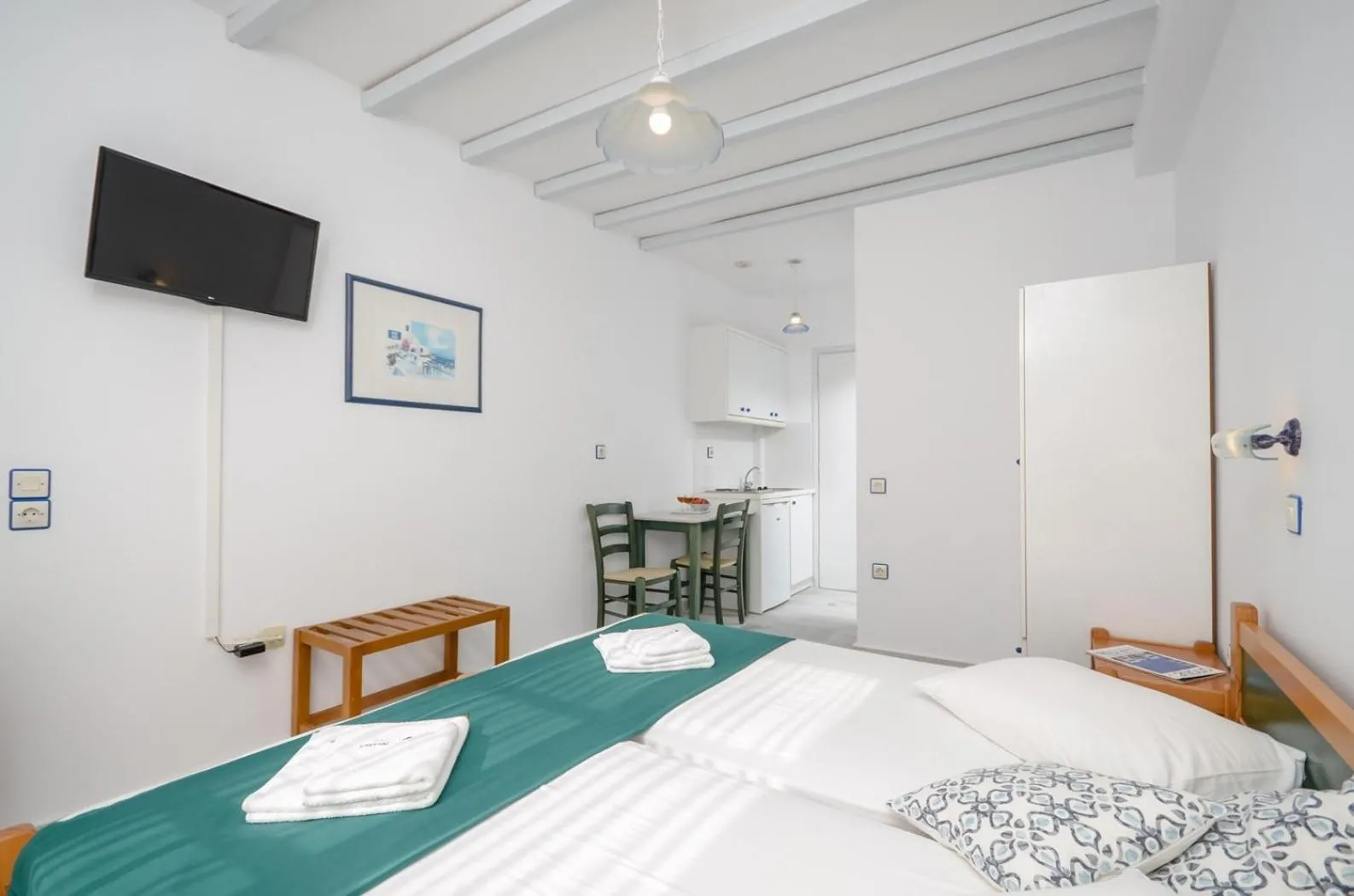 Spring, Bed in Nostos Studios at Saint George beach Agios Georgios Chora Naxos town