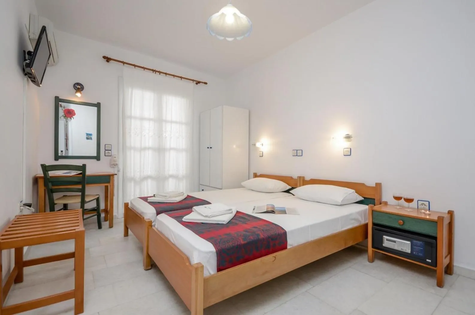 Spring, Bed in Nostos Studios at Saint George beach Agios Georgios Chora Naxos town