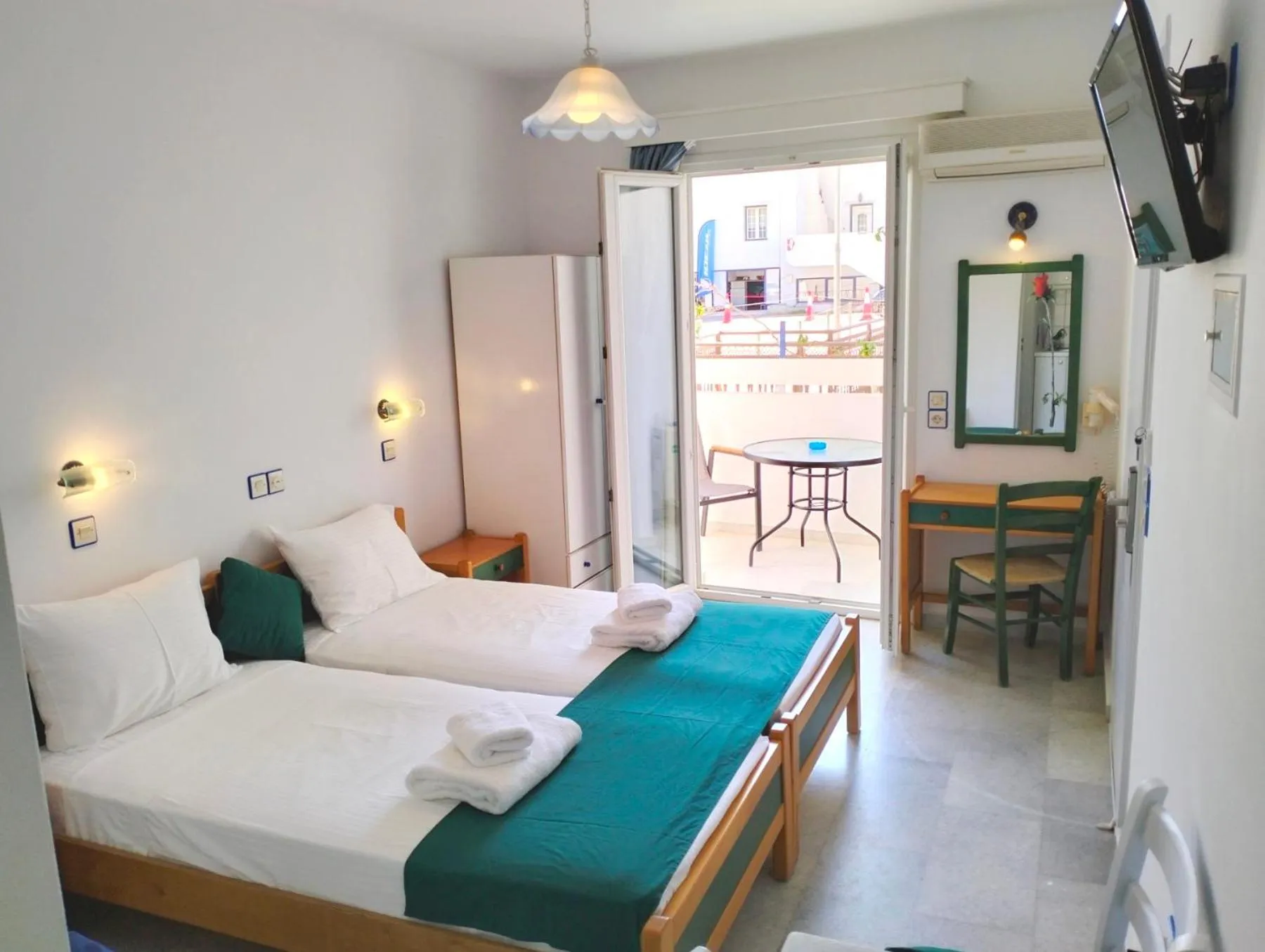 Bed in Nostos Studios at Saint George beach Agios Georgios Chora Naxos town