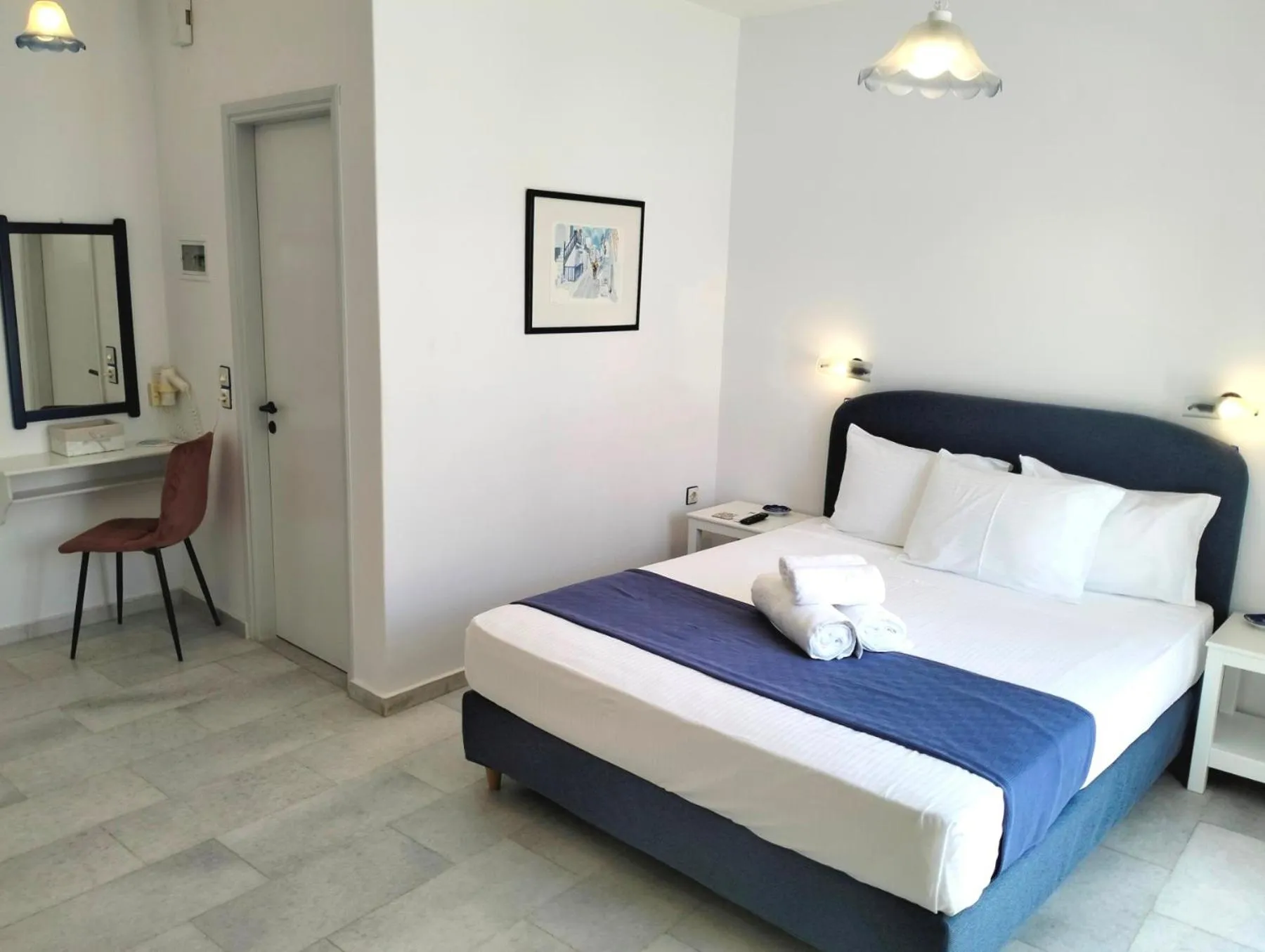 Bedroom, Bed in Nostos Studios at Saint George beach Agios Georgios Chora Naxos town