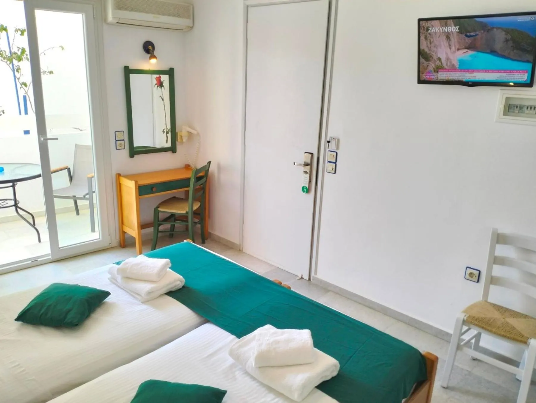 Bed in Nostos Studios at Saint George beach Agios Georgios Chora Naxos town