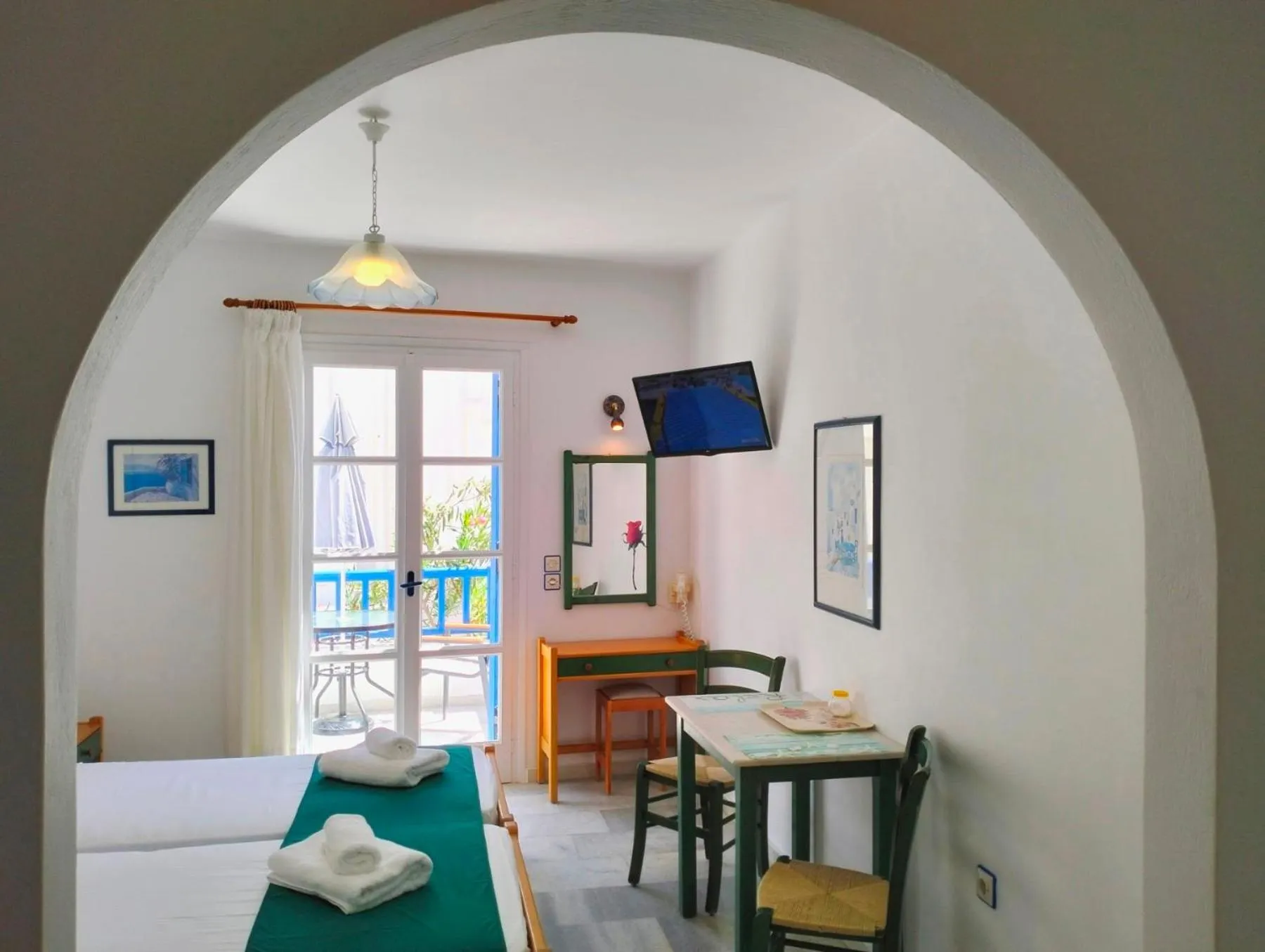 TV and multimedia, Bed in Nostos Studios at Saint George beach Agios Georgios Chora Naxos town