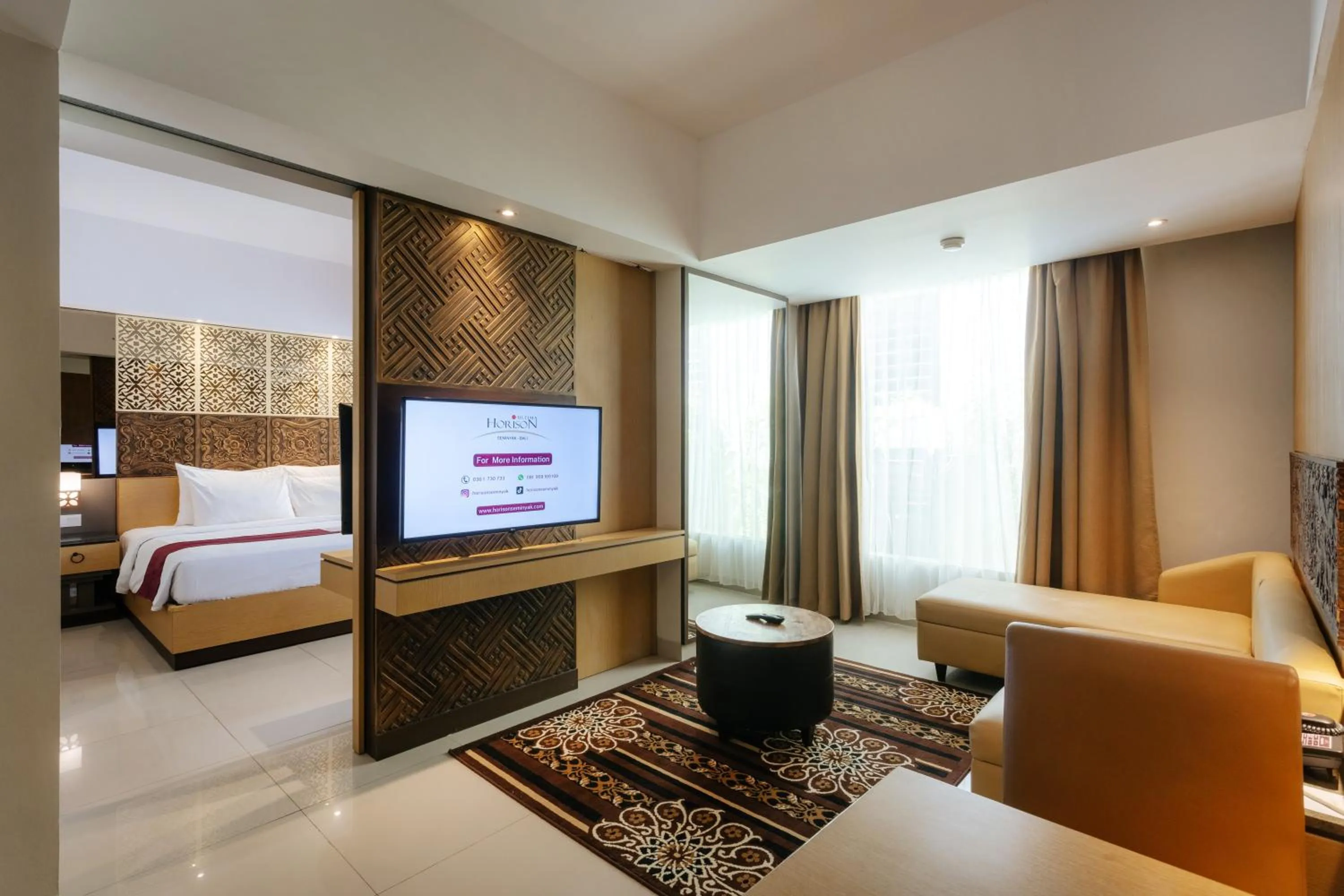 Communal lounge/ TV room, Bed in Horison Ultima Seminyak Bali - CHSE Certified