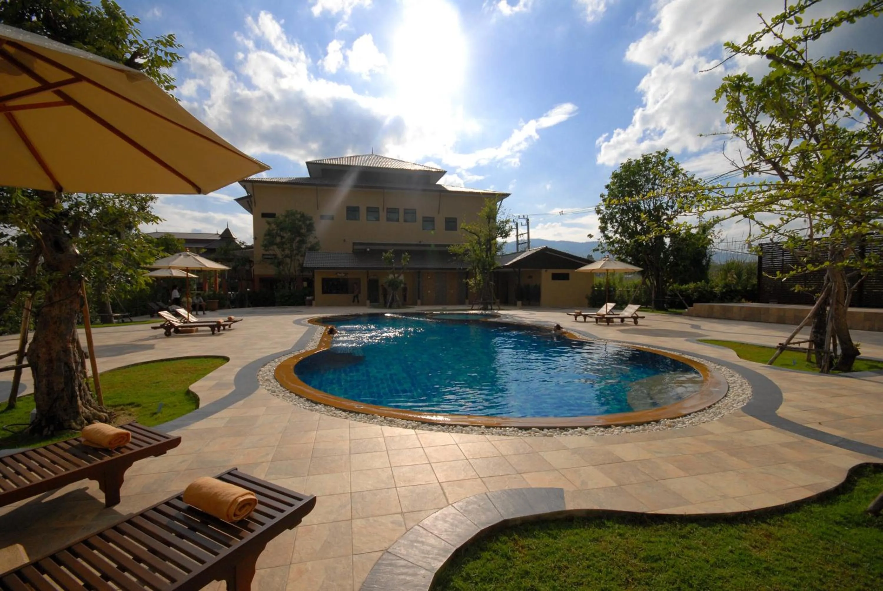 Swimming pool in Phufa Waree Chiangrai Resort - SHA Extra Plus