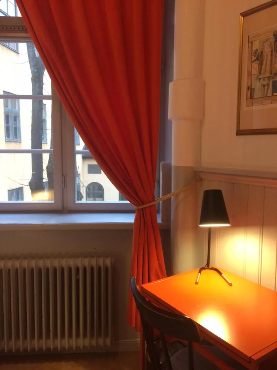 Seating area in Castanea Old Town Hostel