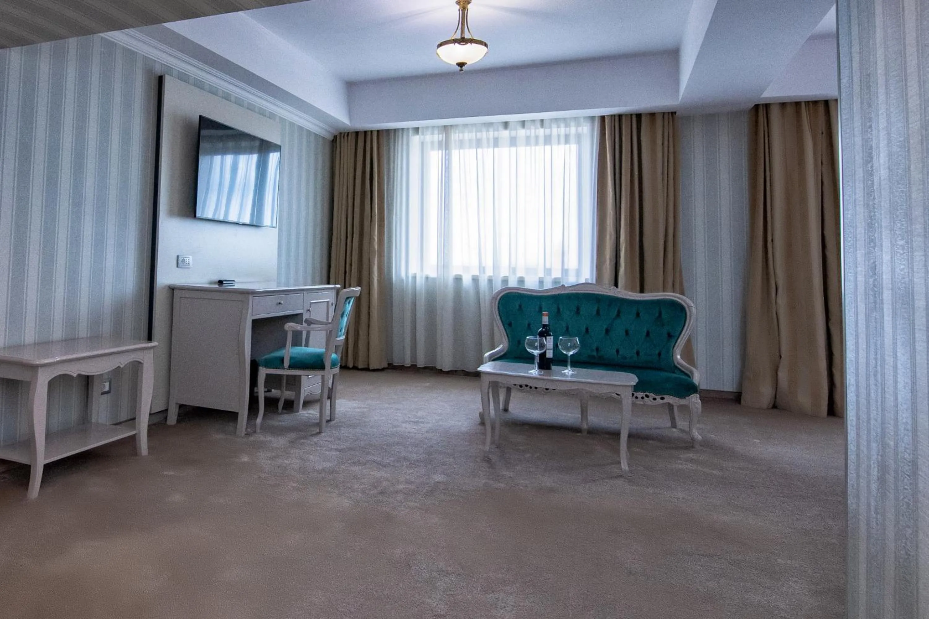 Living room in Hotel Roman by Dumbrava Business Resort