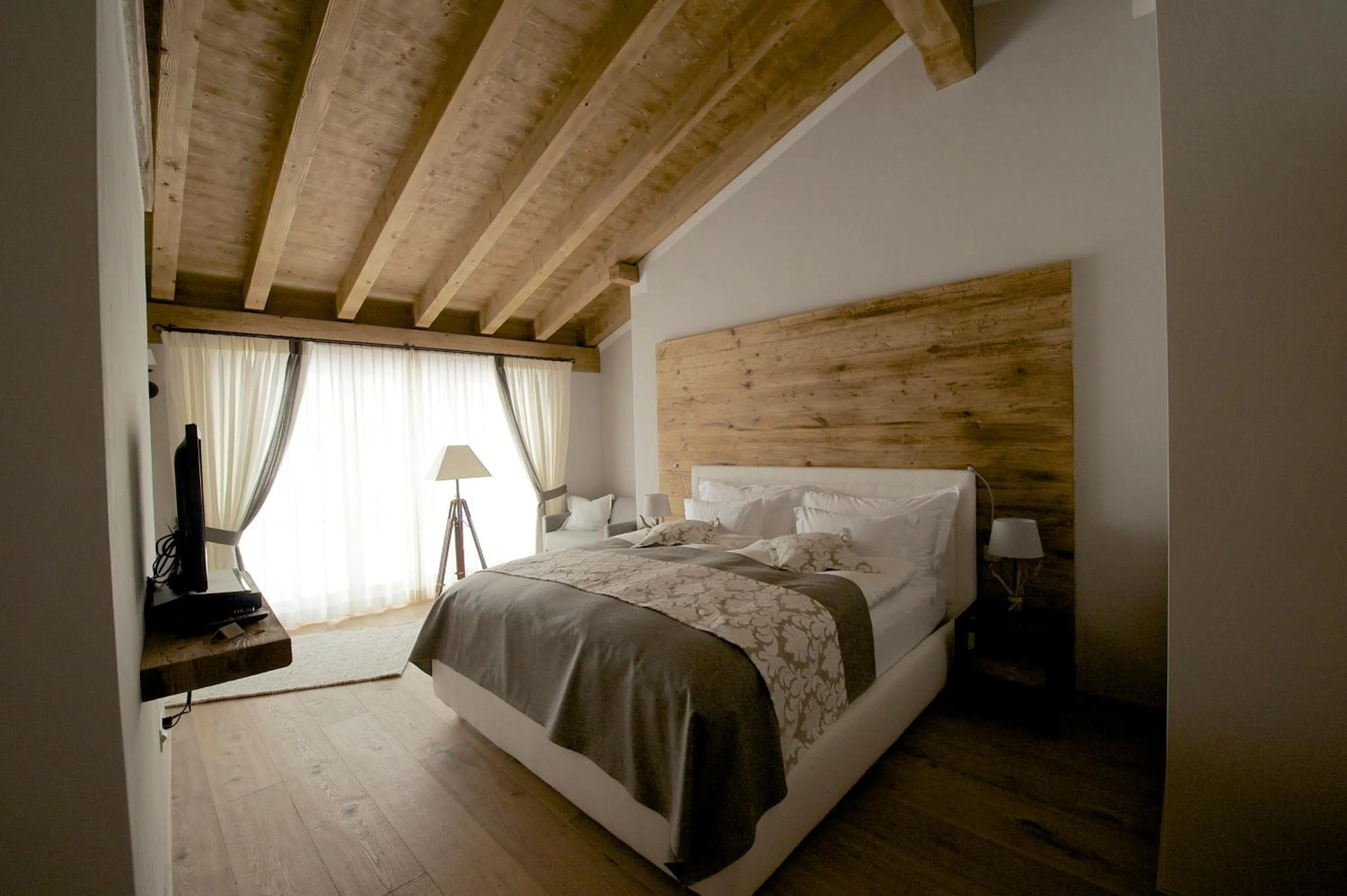 Bed in Hotelino Petit Chalet