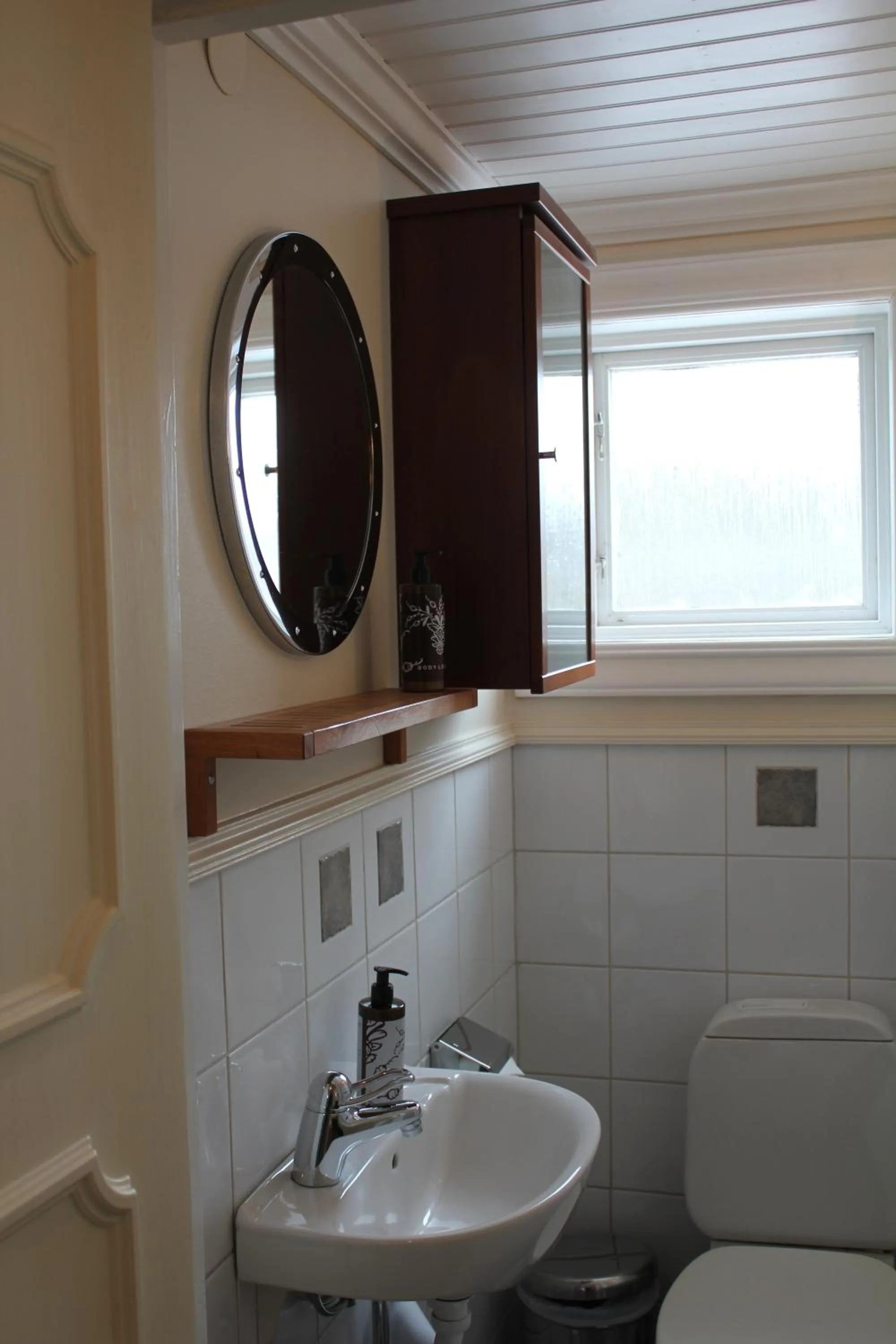 Toilet in Olarsgården Hotell