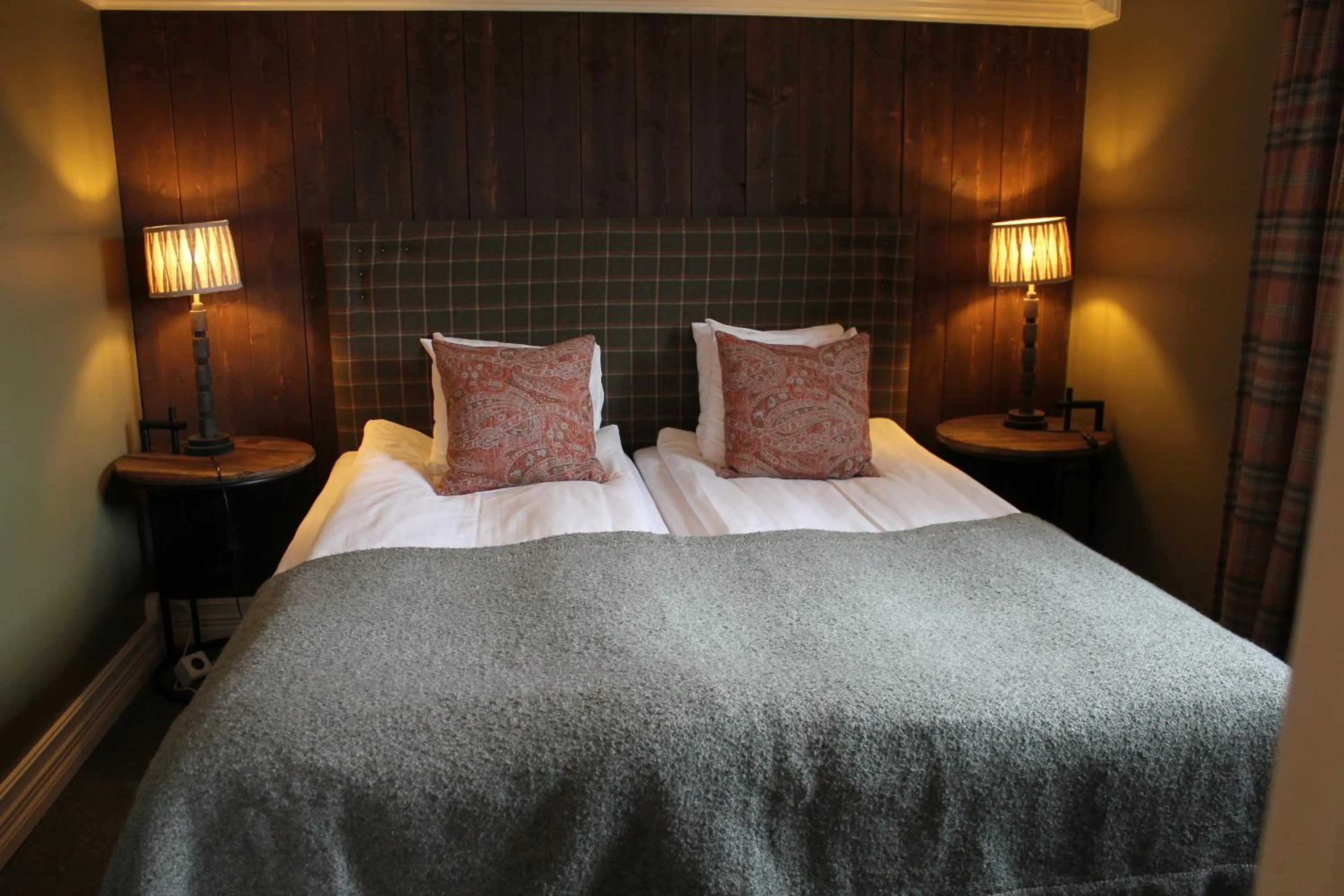 Bed in Olarsgården Hotell