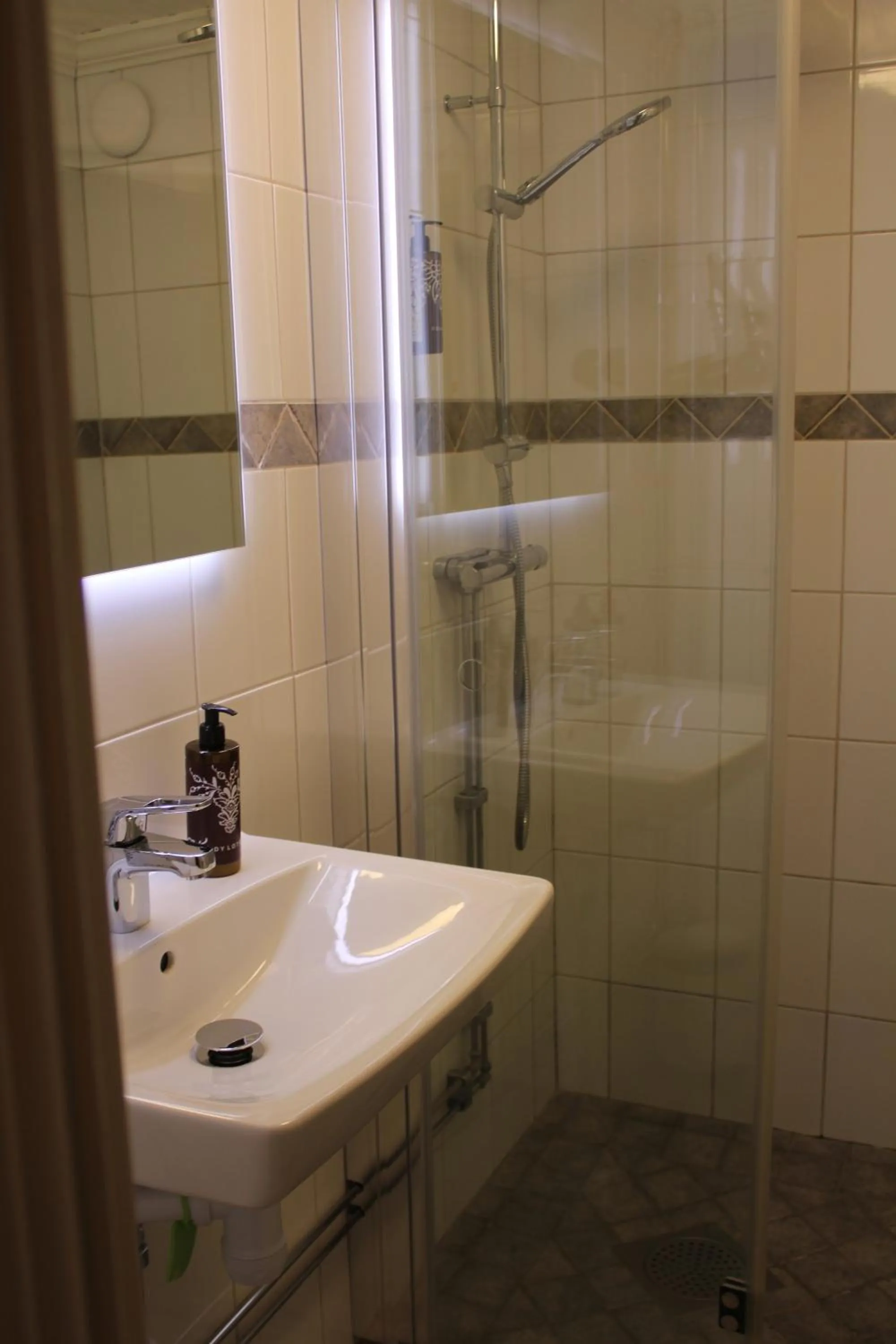 Bathroom in Olarsgården Hotell