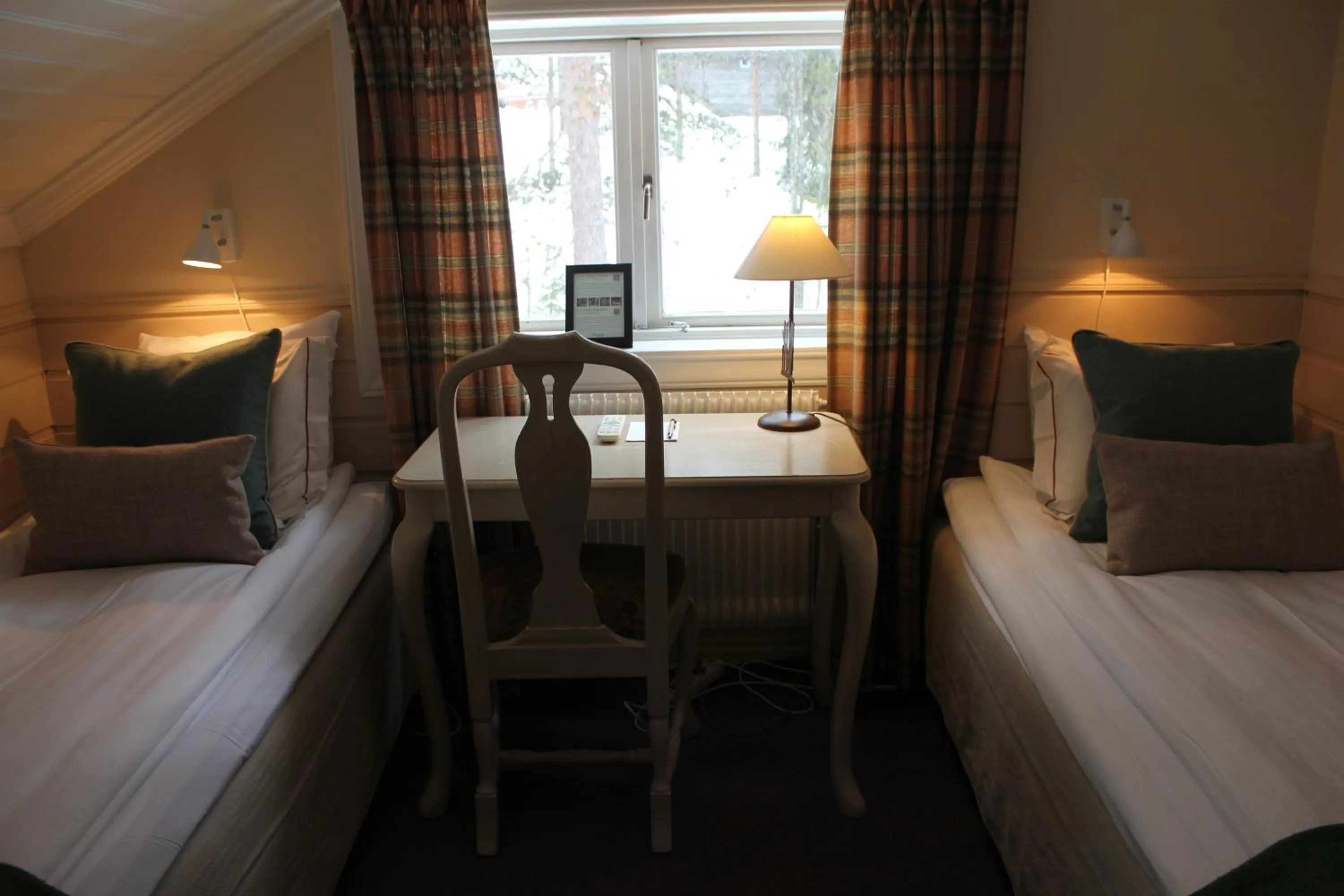 Bed in Olarsgården Hotell