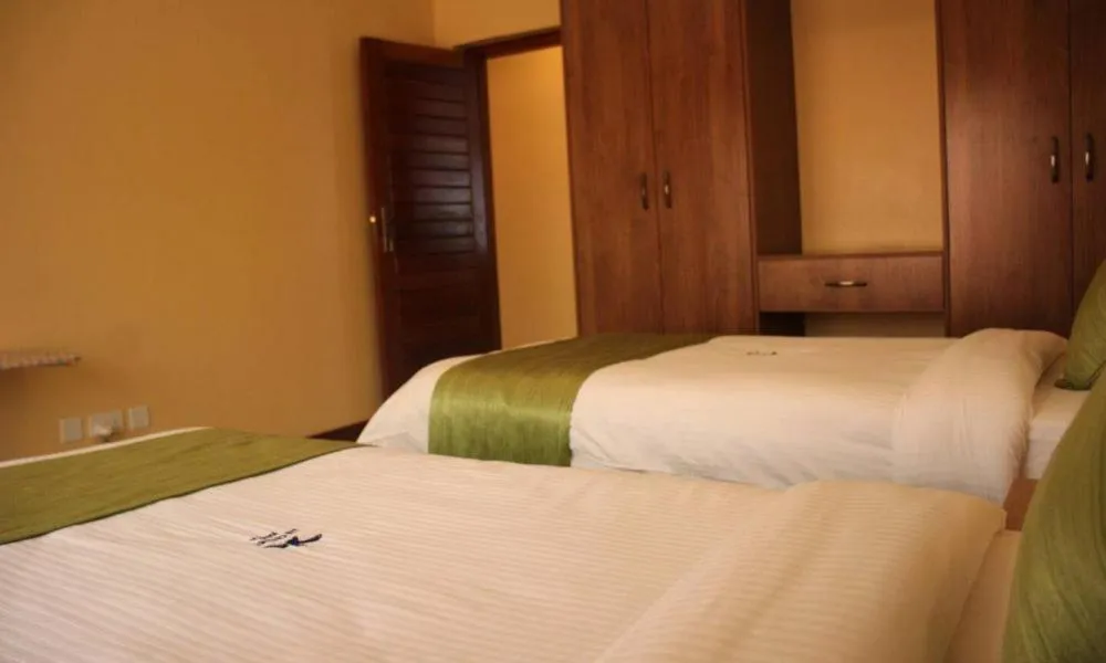 Photo of the whole room, Bed in LIA Hotel & Training Centre