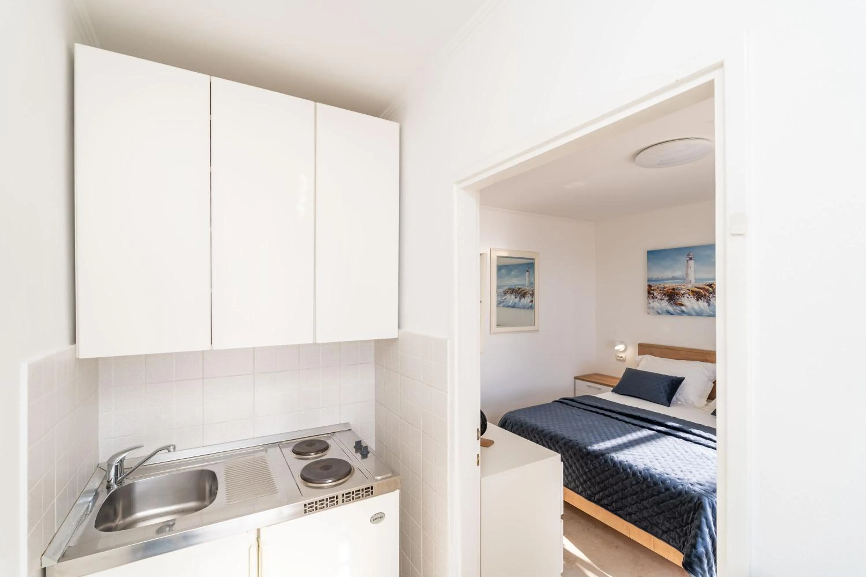 Bed in Apartments and Room Lora