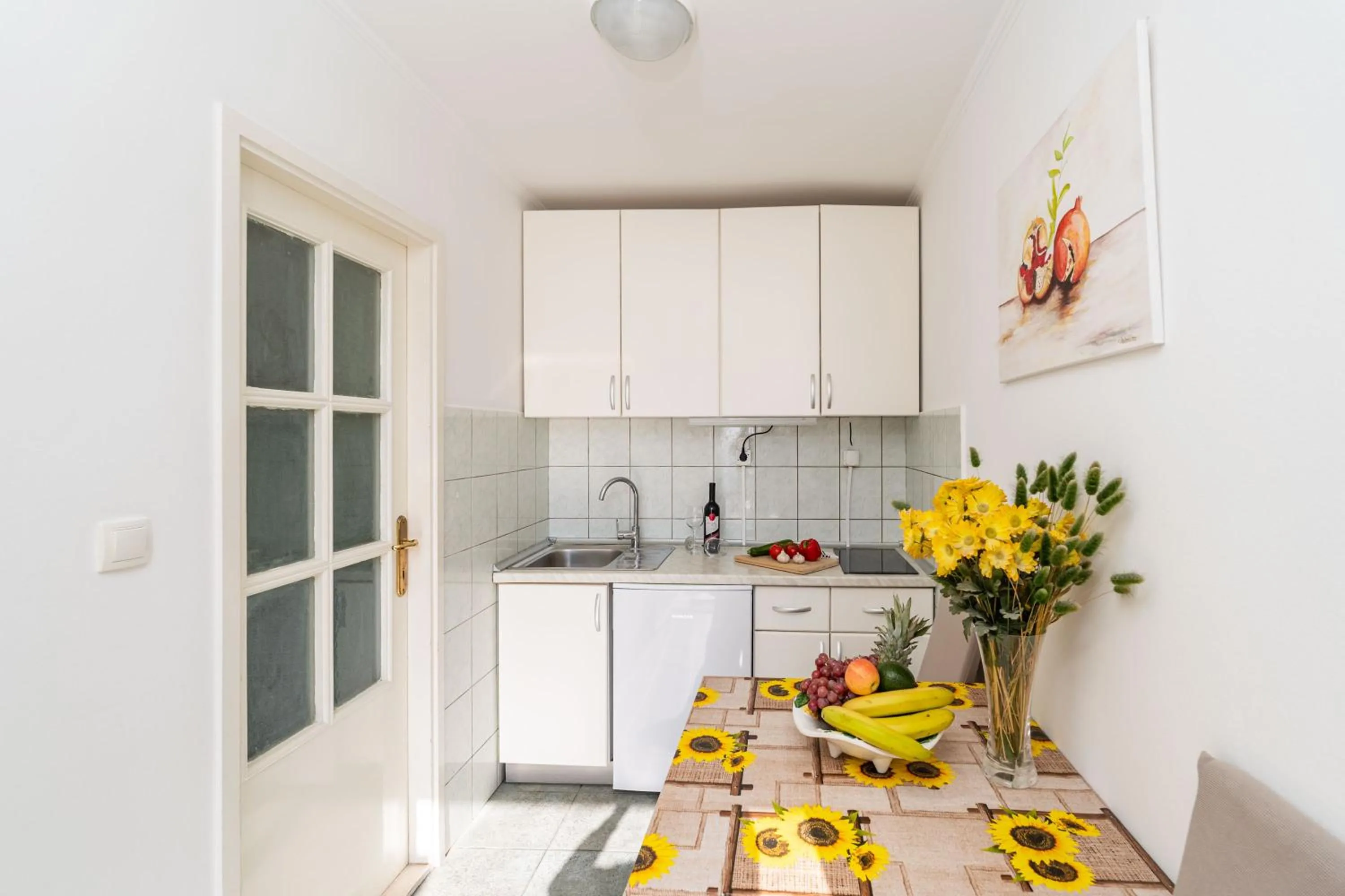 Kitchen or kitchenette in Apartments and Room Lora