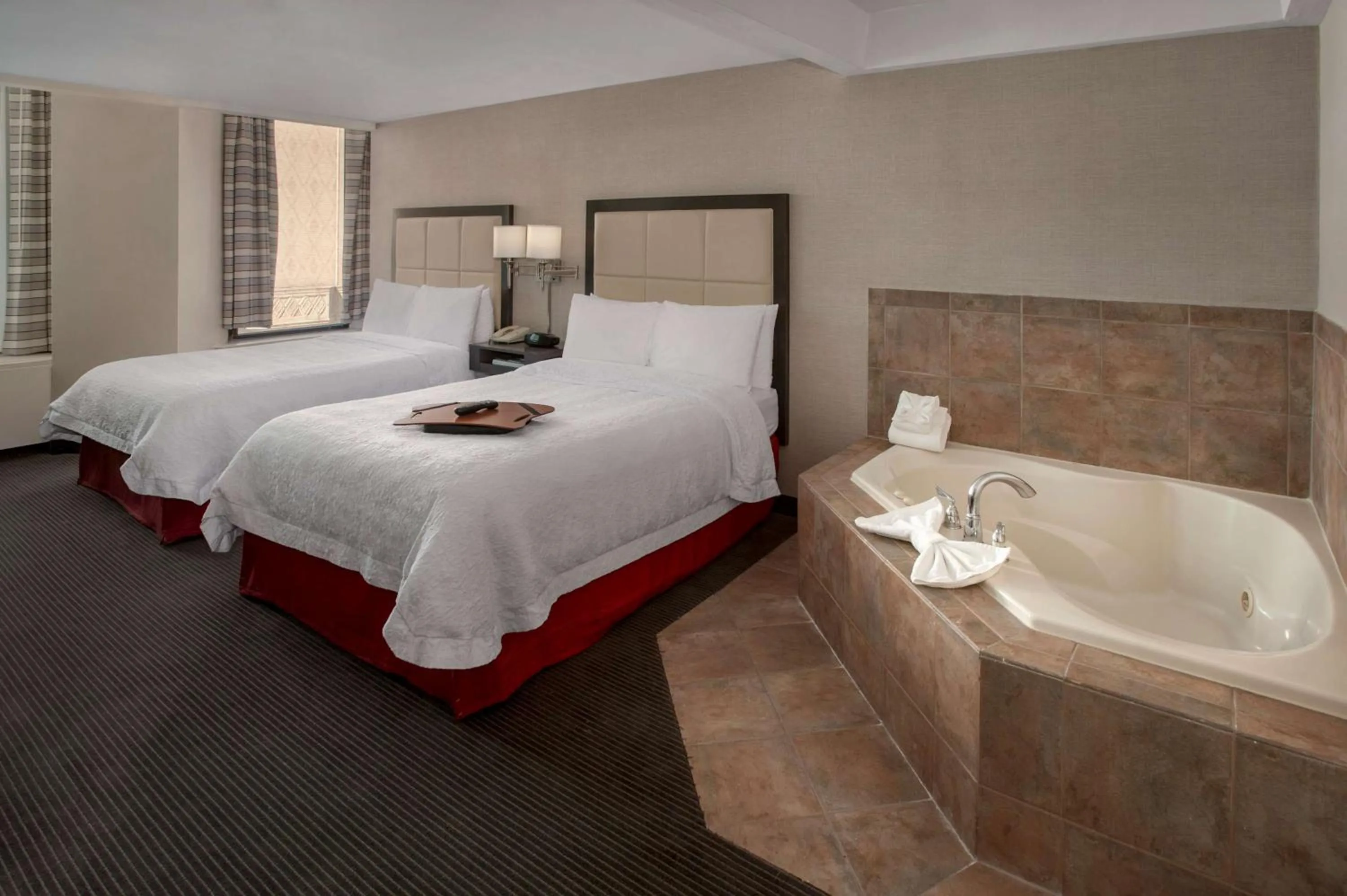 Bed in Hampton Inn & Suites Milwaukee Downtown