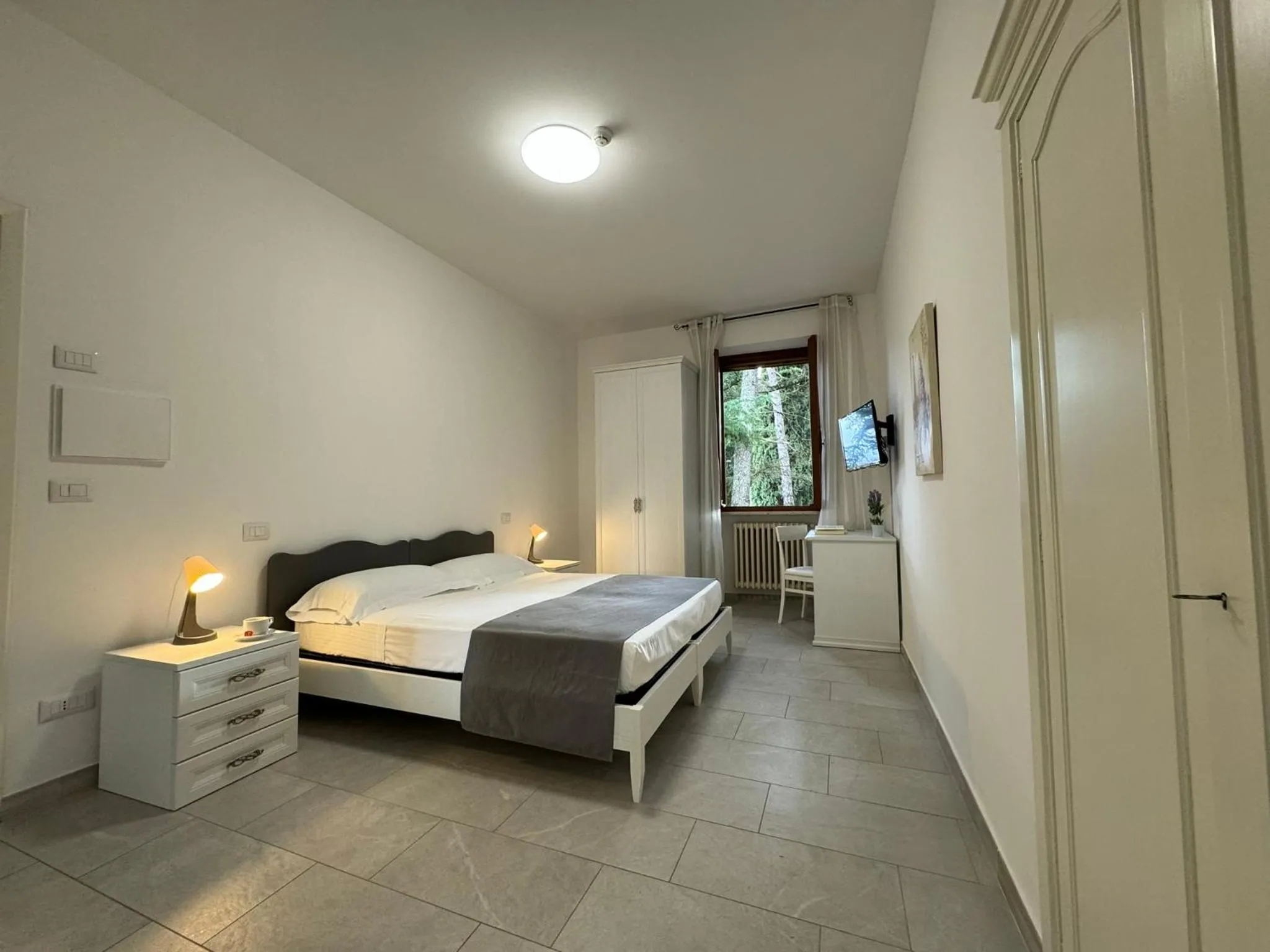 Photo of the whole room, Bed in Monastero SS. Annunziata