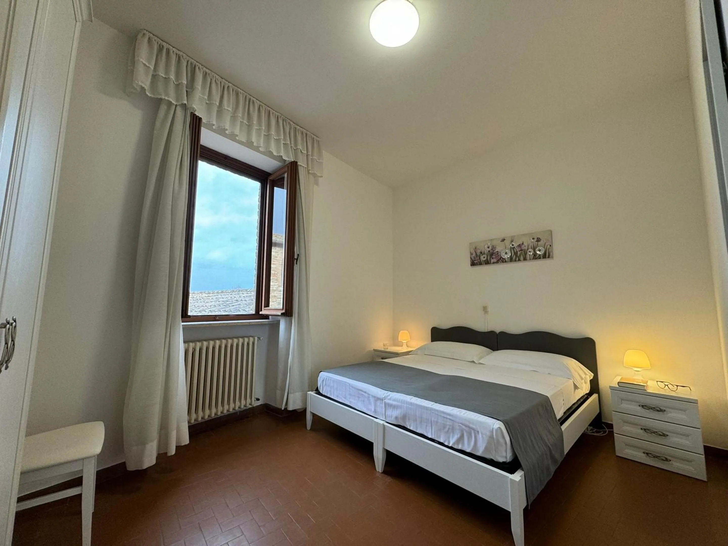 Photo of the whole room, Bed in Monastero SS. Annunziata