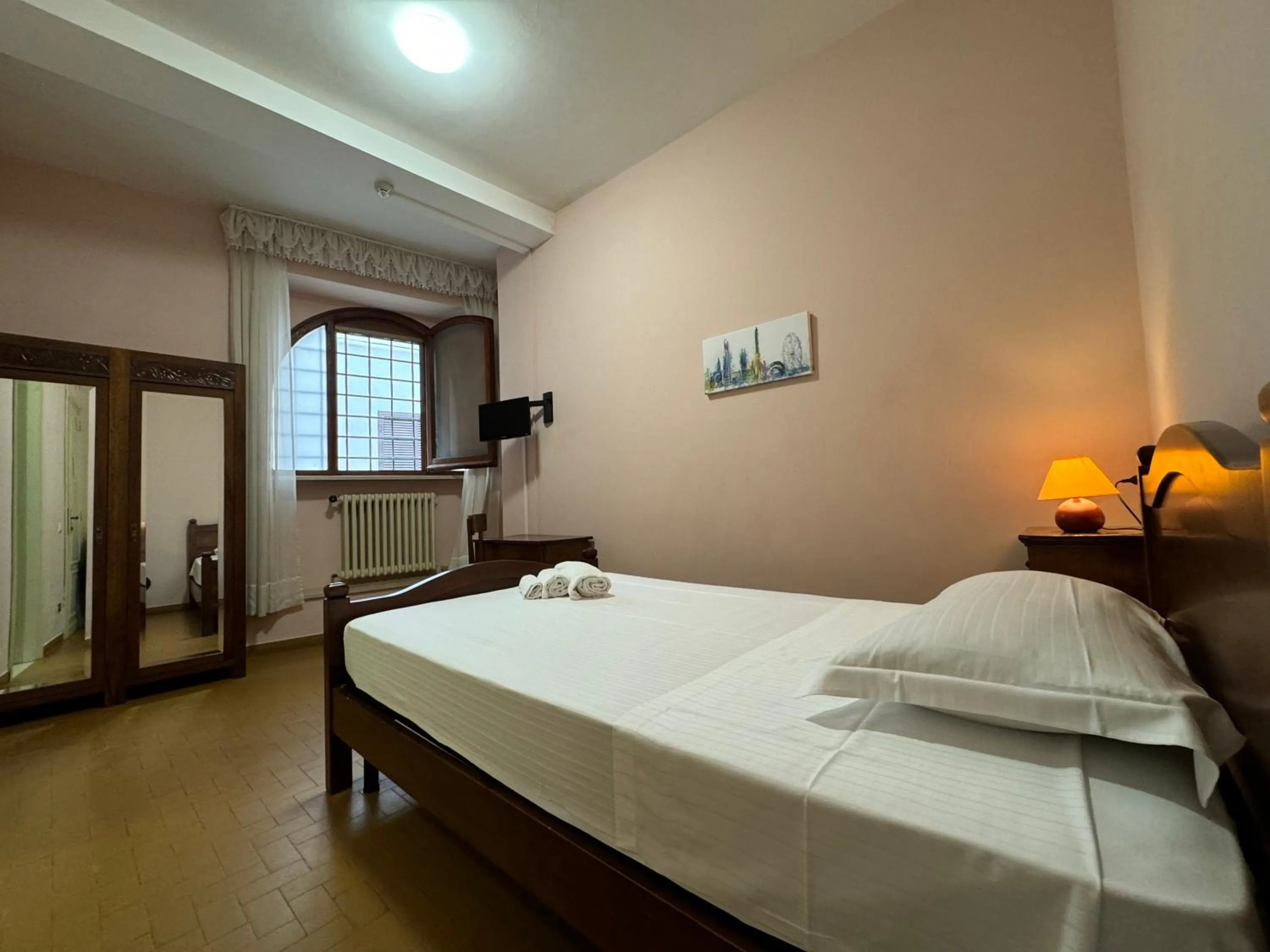 Photo of the whole room, Bed in Monastero SS. Annunziata