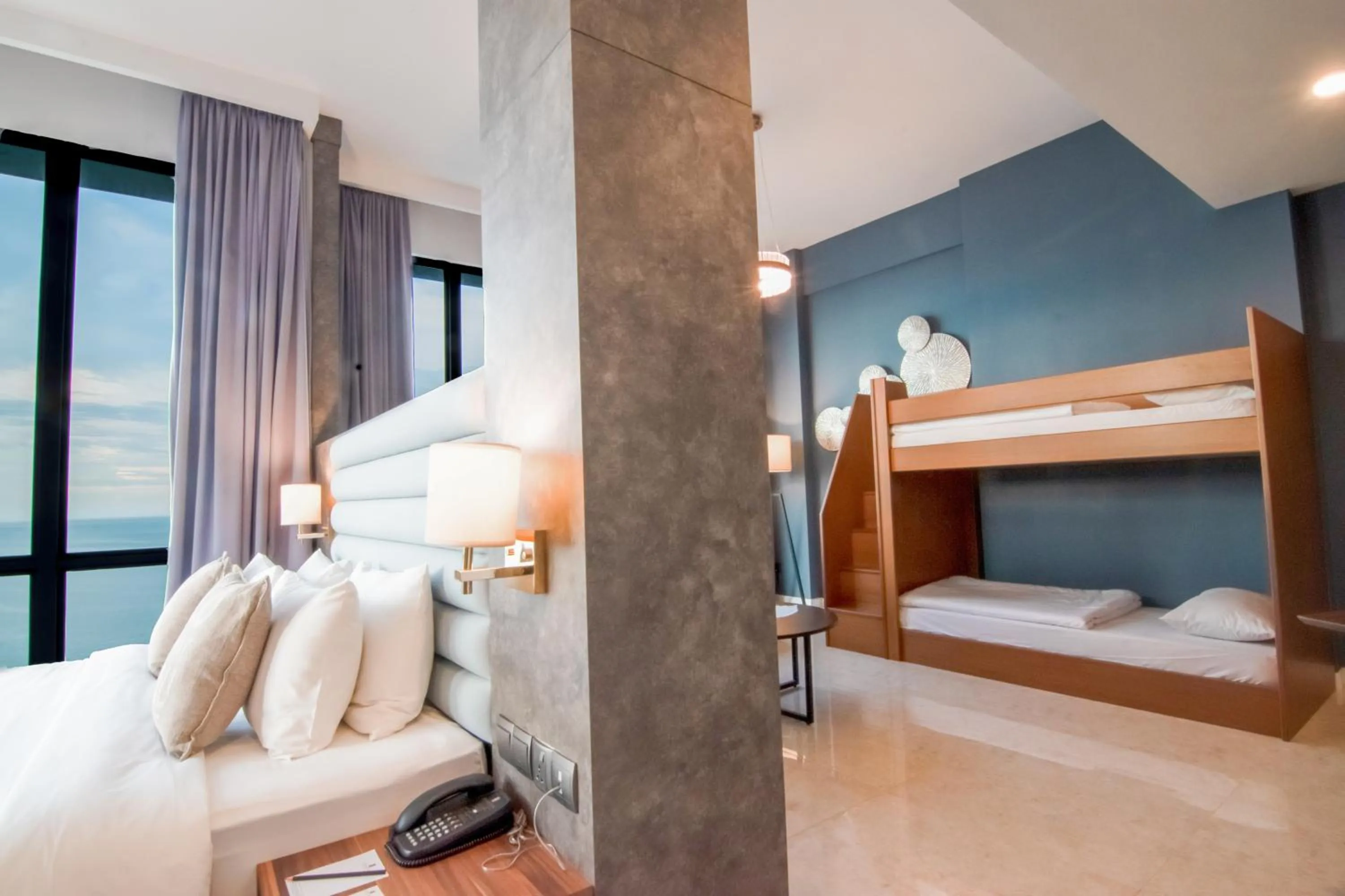 Bed in Hompton Hotel by the Beach