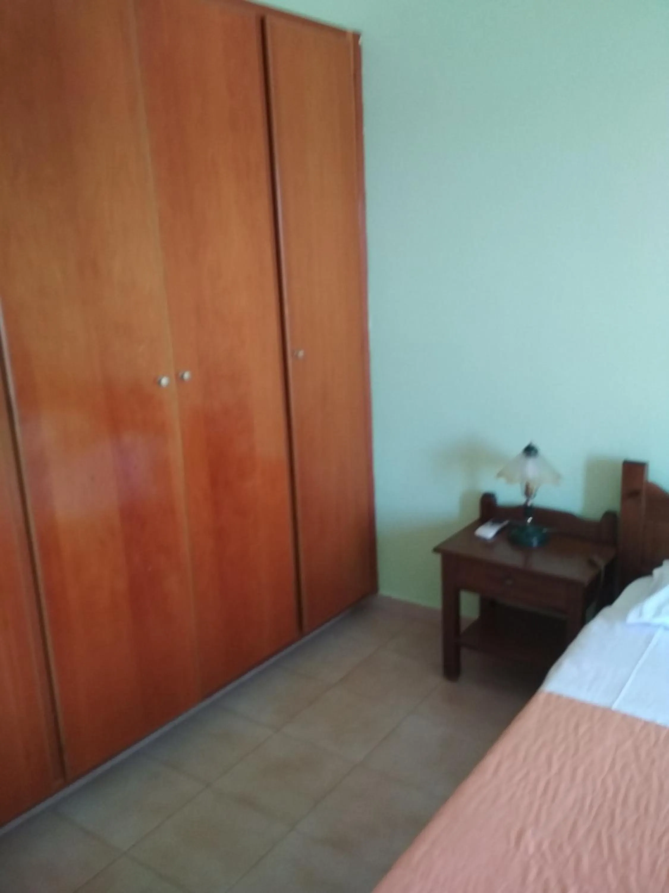 Bed in Flamingo Apartments