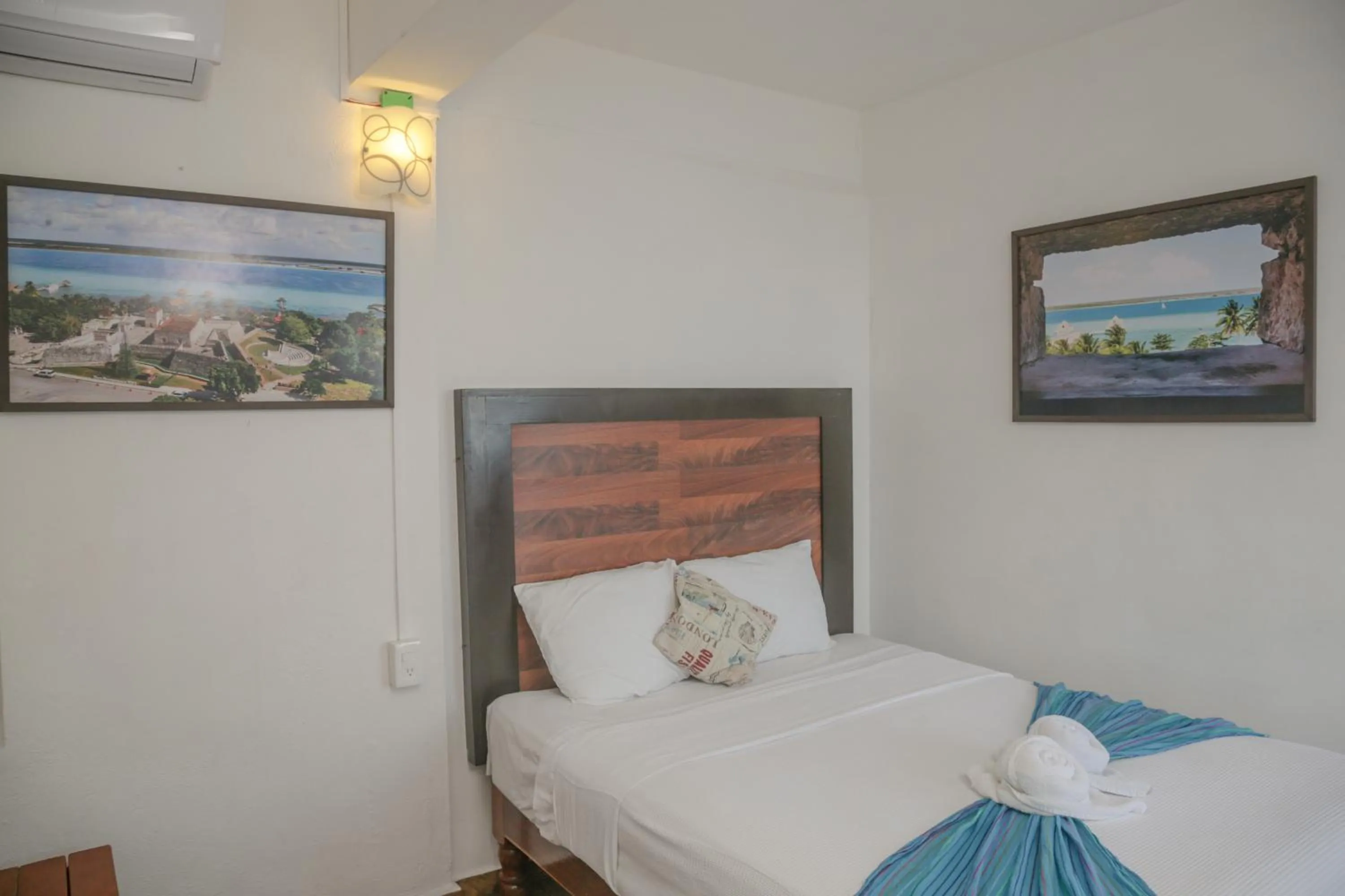 Bed in Seven Blue House Village & Lodge