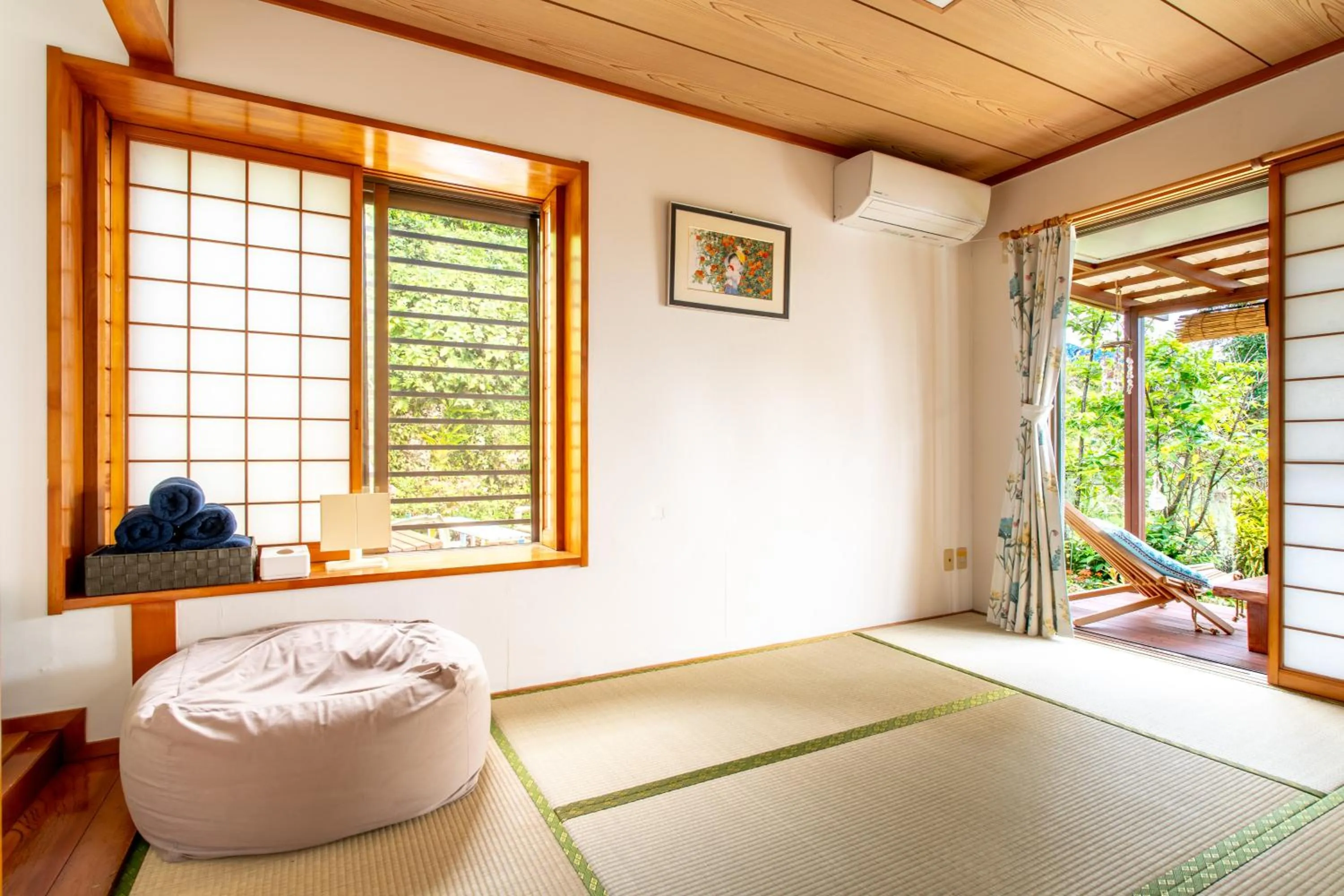 Photo of the whole room, Bed in Beach House Yomitan