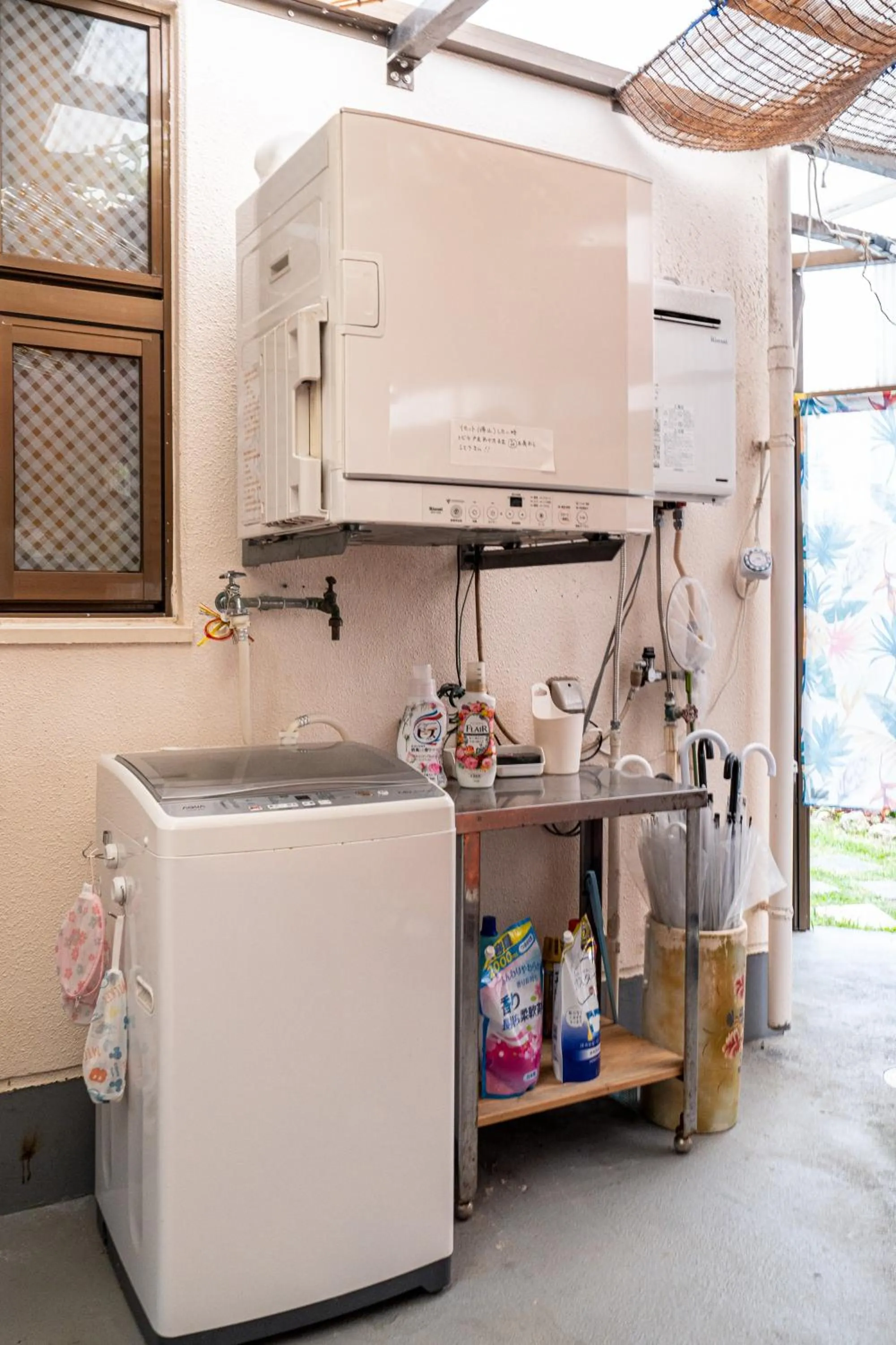 washing machine in Beach House Yomitan