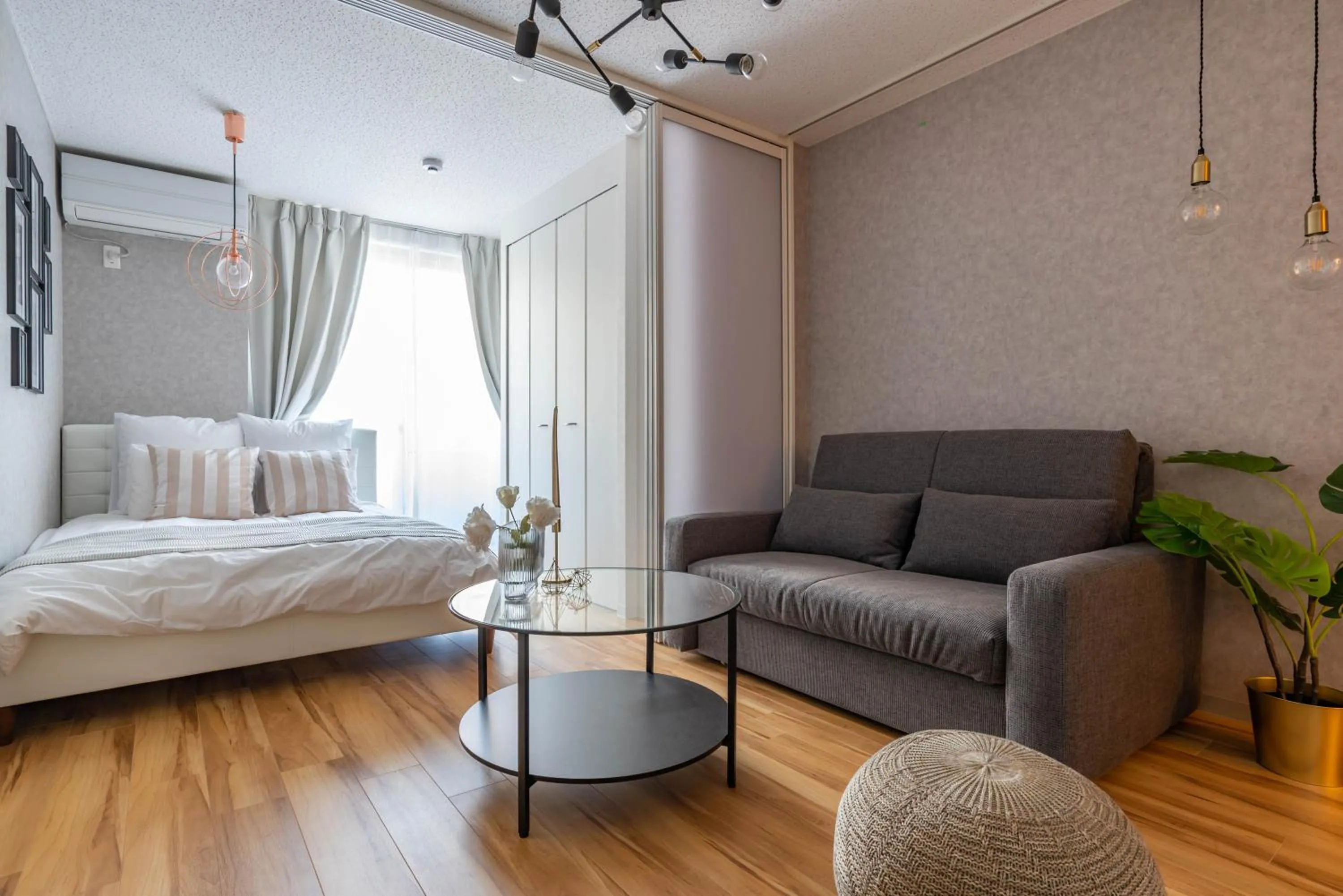 Living room, Bed in Exia Daikoku AFP Apartment