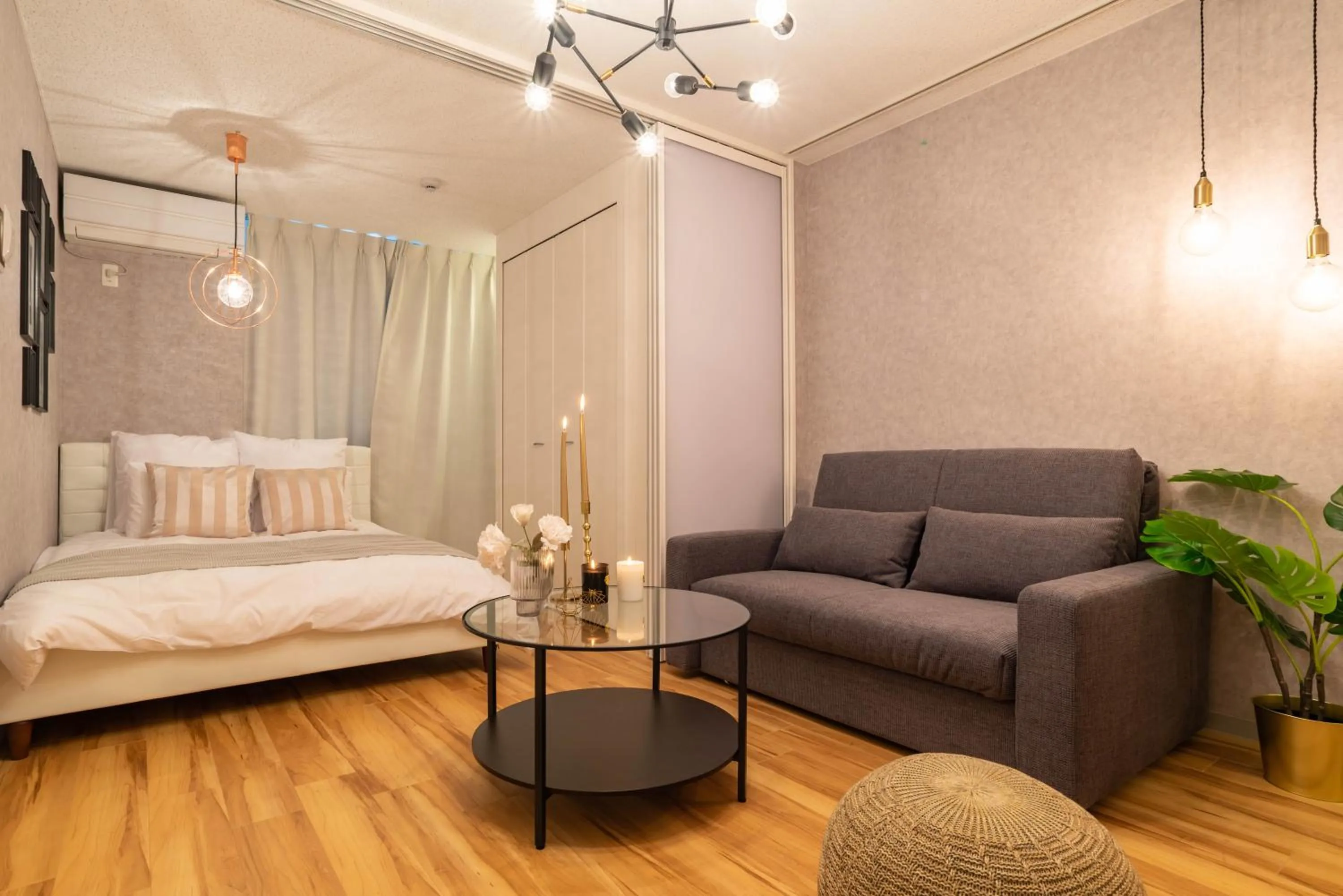 Living room, Bed in Exia Daikoku AFP Apartment