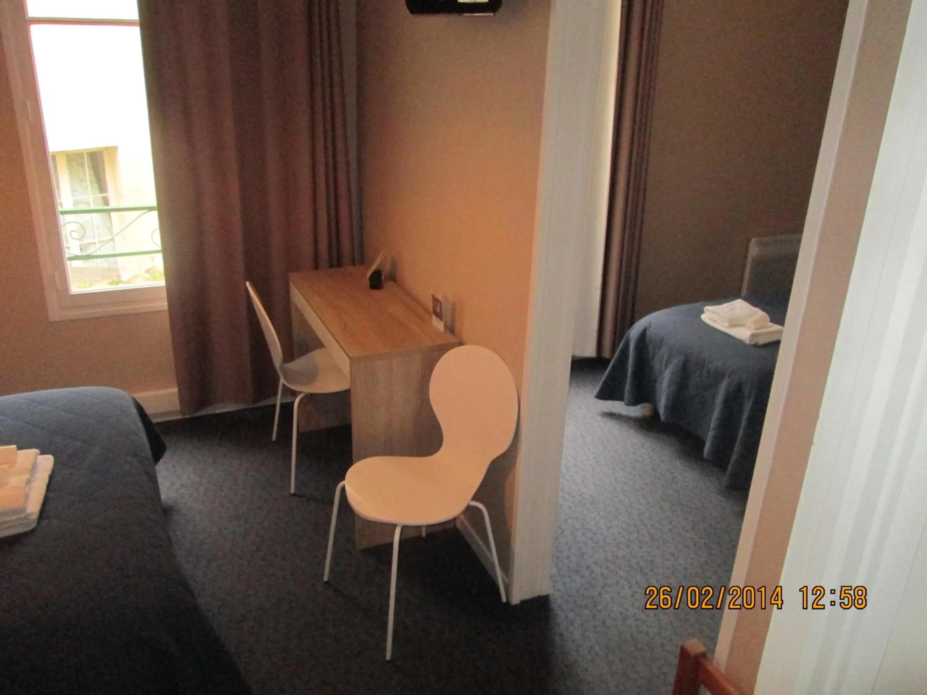 Photo of the whole room, Bed in Hôtel-Restaurant Le Blueberry