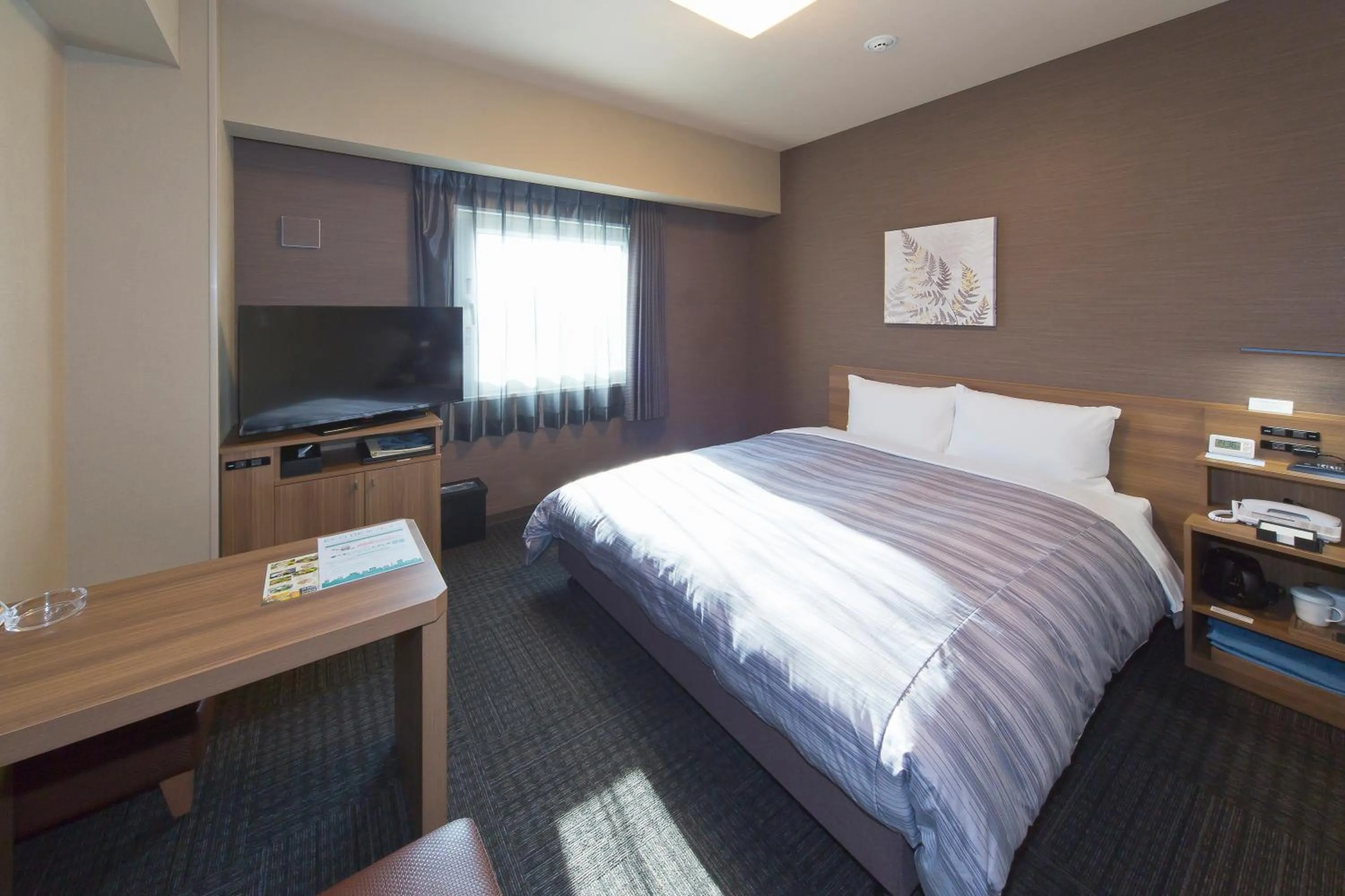 Bed in Hotel Route-inn Yamaguchi Yuda Onsen