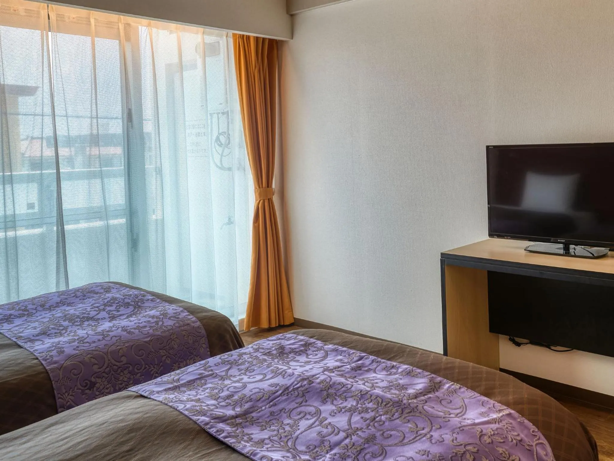 Bed in ミチ旅ホテル 読谷