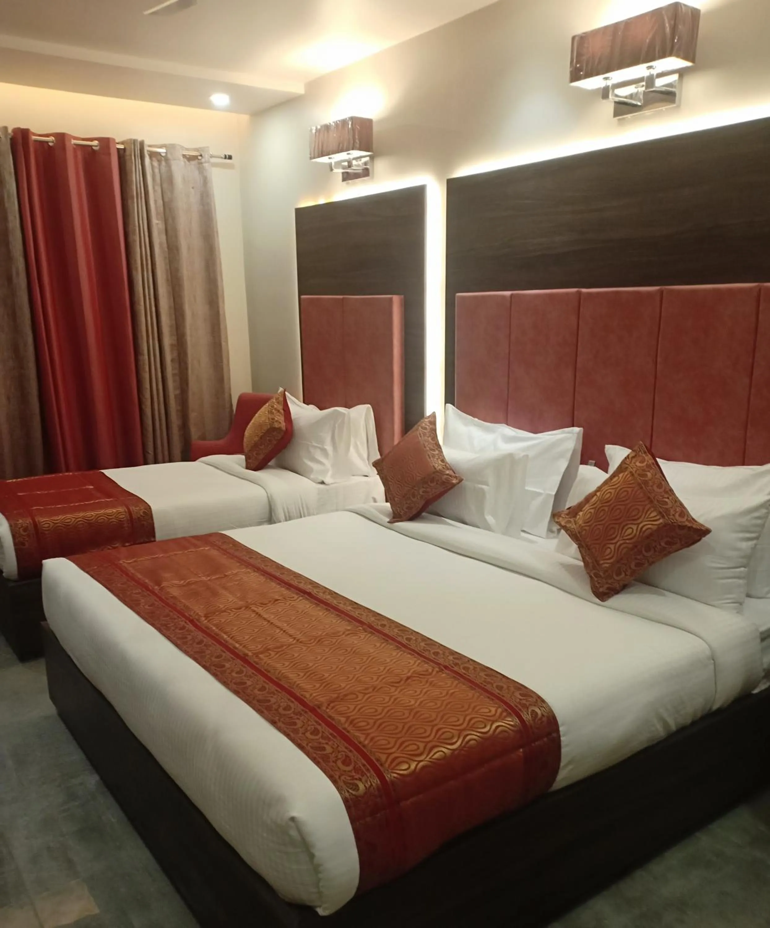 Photo of the whole room, Bed in Hotel Abhinav International