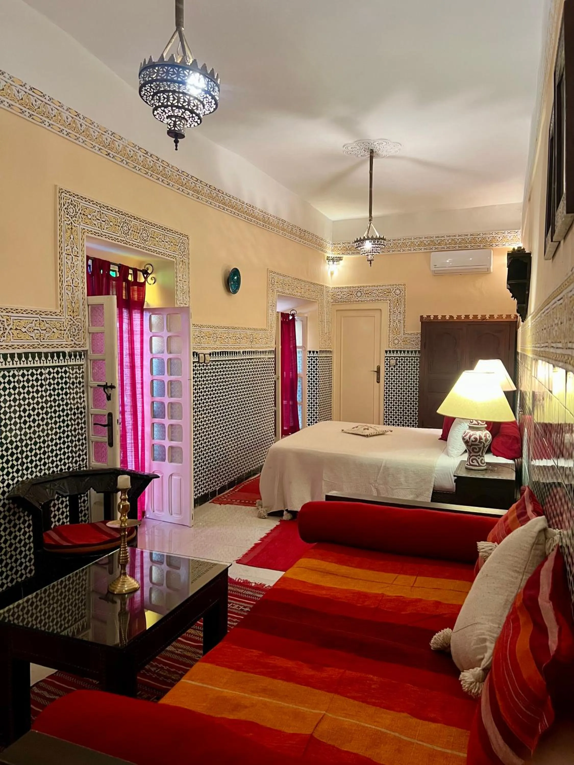 Bed in Riad Hotel Sherazade