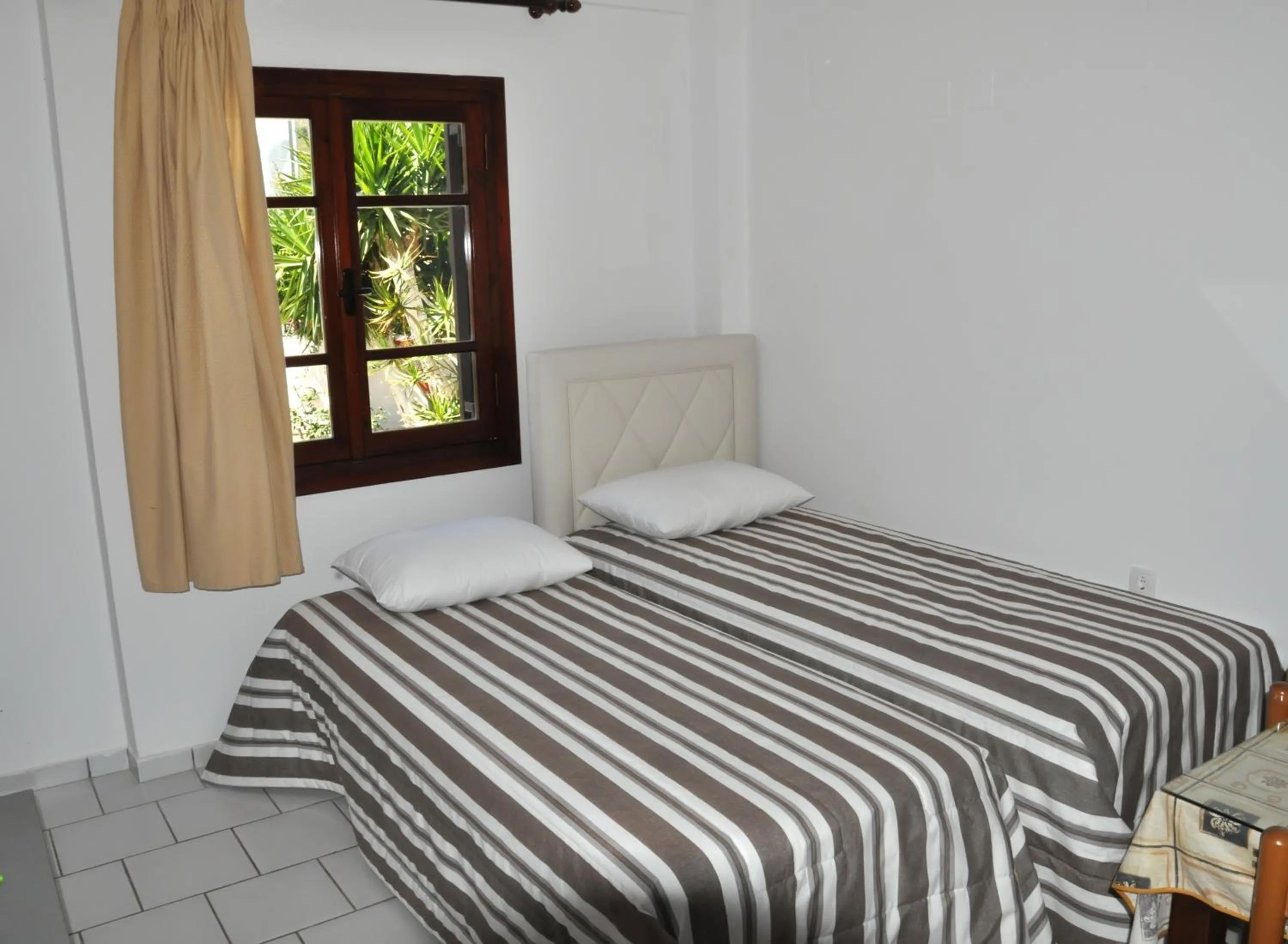 Bed in Pennystella Apartments