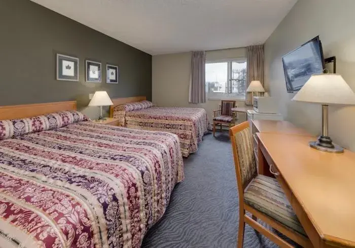 Queen Room with Two Queen Beds Pet Friendly in Heritage Inn Hotel & Convention Centre - Taber Queen Room with Two Queen Beds Pet Friendly in Heritage Inn Hotel & Convention Centre - Taber