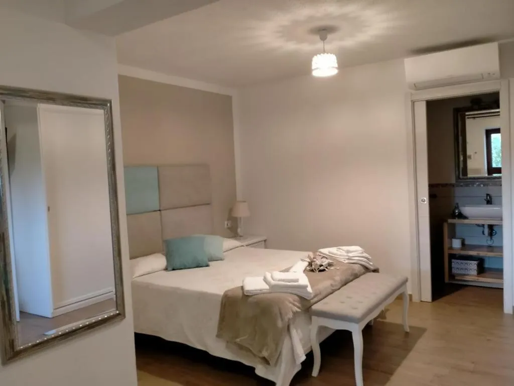 Bed in Il Giardino di Daniela Apartments