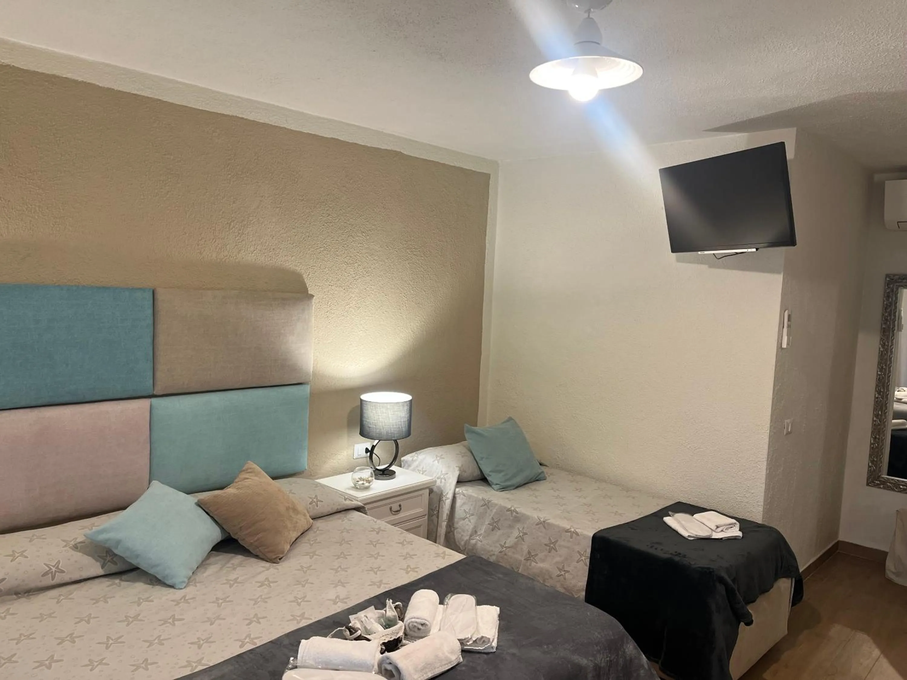 Bed in Il Giardino di Daniela Apartments