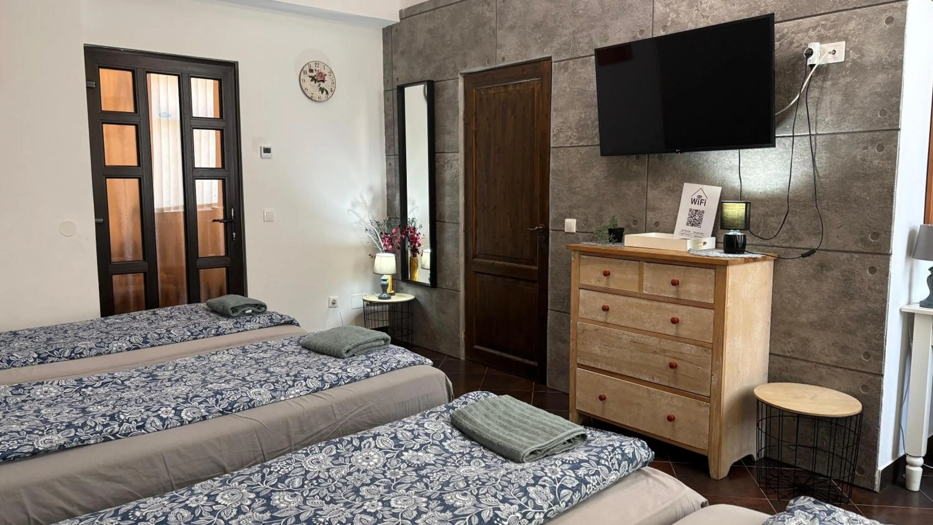 Bed in Pannónia Rooms and Apartments