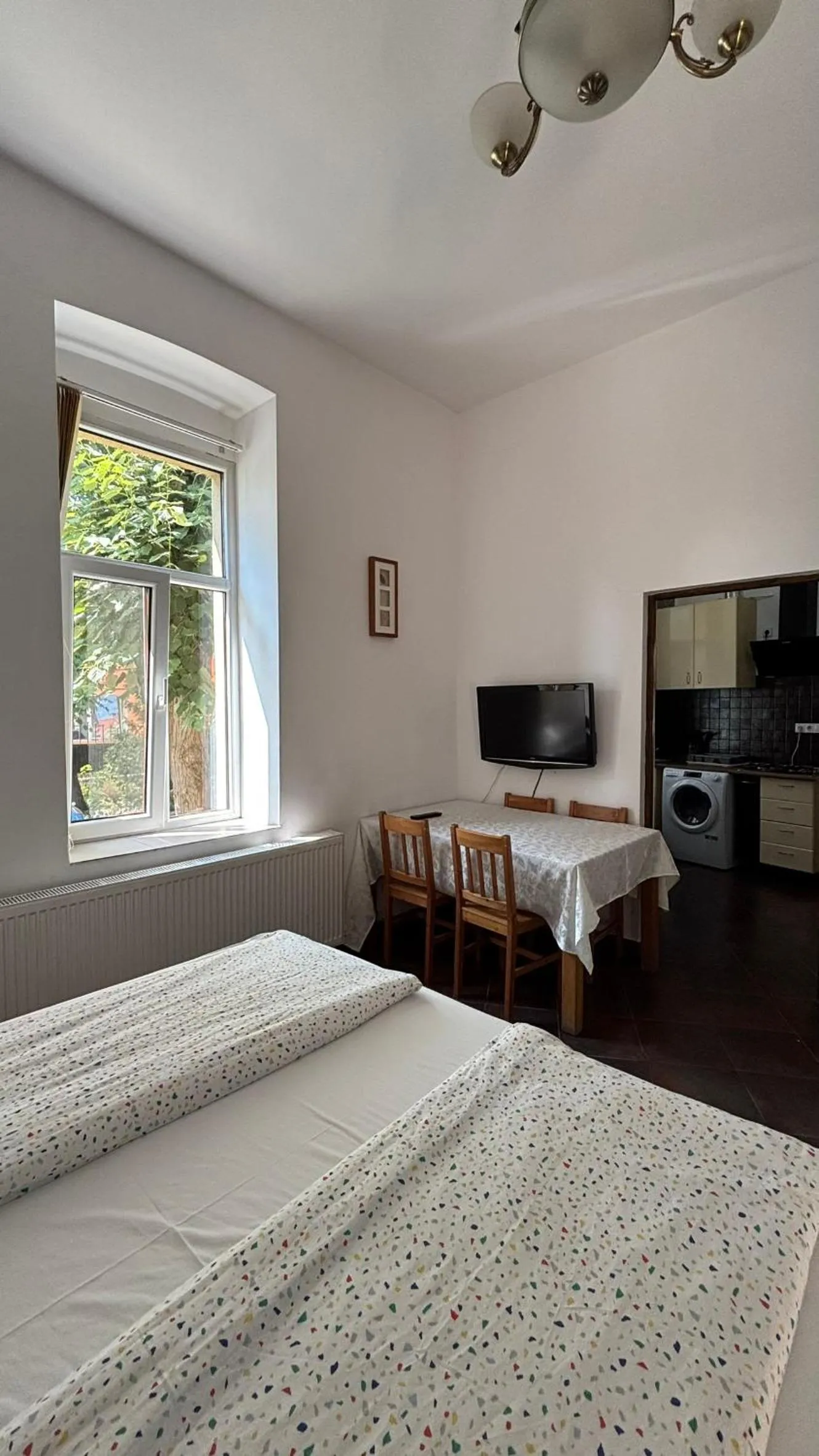 Bed in Pannónia Rooms and Apartments