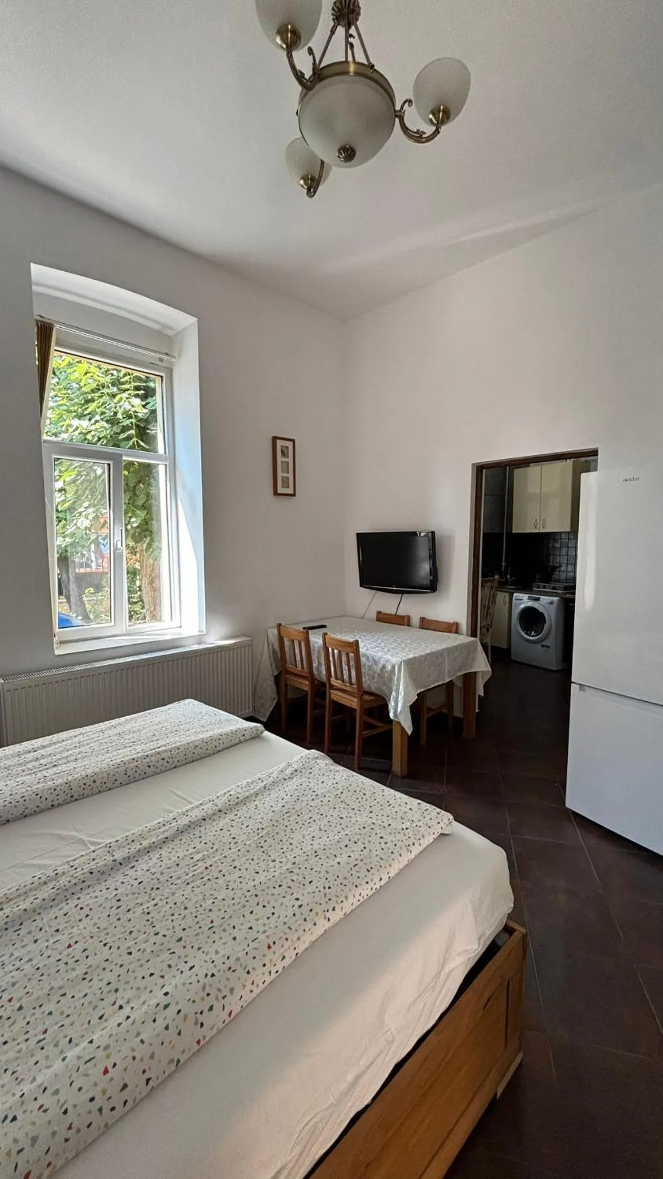 Bed in Pannónia Rooms and Apartments